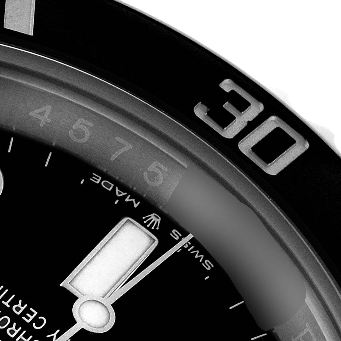The image shows a close-up of the bezel and part of the dial on a Rolex Submariner 126610 Men
s Stainless Steel Black Dial 126610 Men
s Stainless Steel Black Dial watch, highlighting the 30-minute marker.