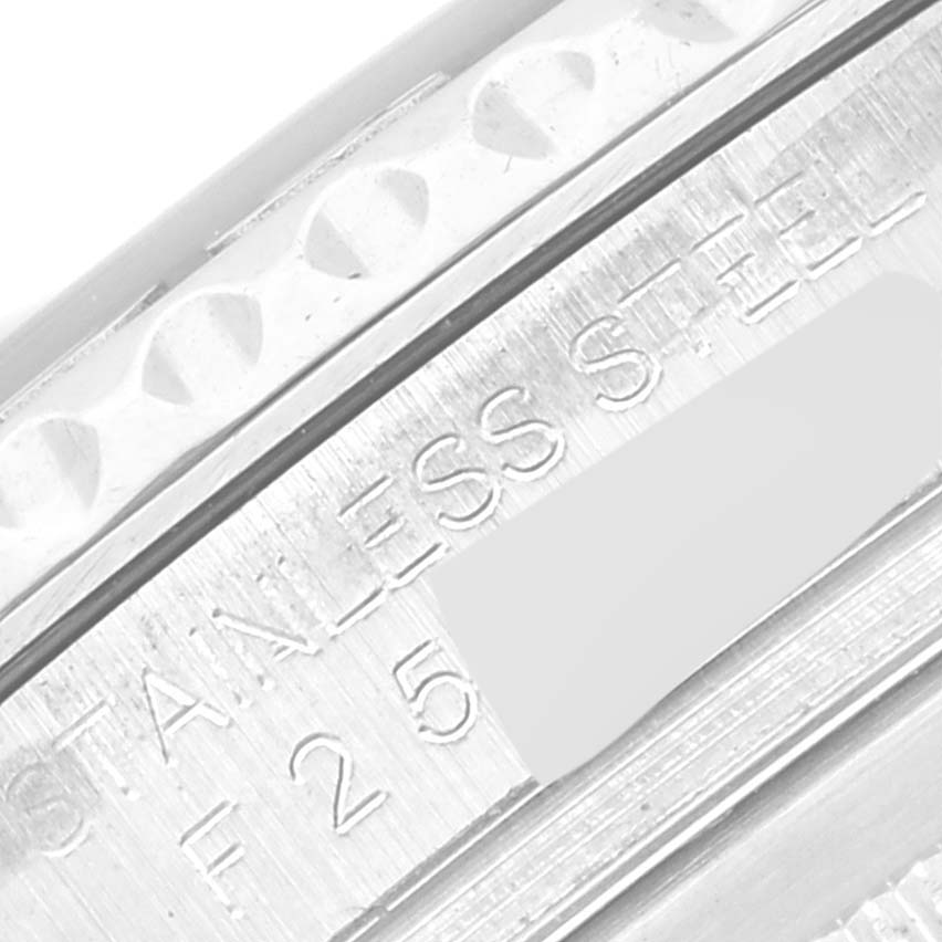 This is a close-up view of the watch casing of the Rolex Yacht-Master 16622 Men's Stainless Steel Silver Dial 16622 Men's Stainless Steel Silver Dial, showing the "STAINLESS STEEL" engraving.