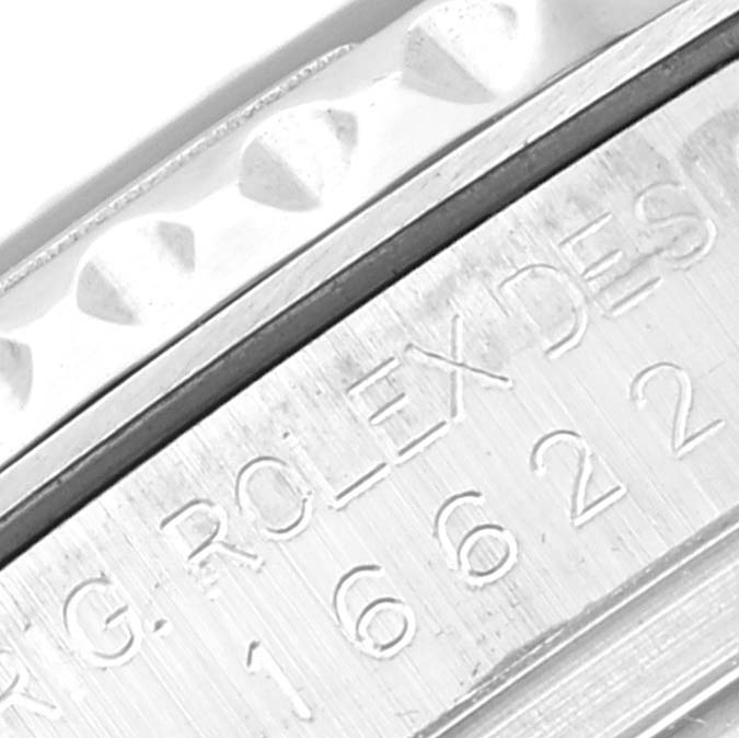 This image shows a close-up of the case side of a Rolex Yacht-Master 16622 Men's Stainless Steel Silver Dial 16622 Men's Stainless Steel Silver Dial model, featuring the engraved model number and part of the bezel.