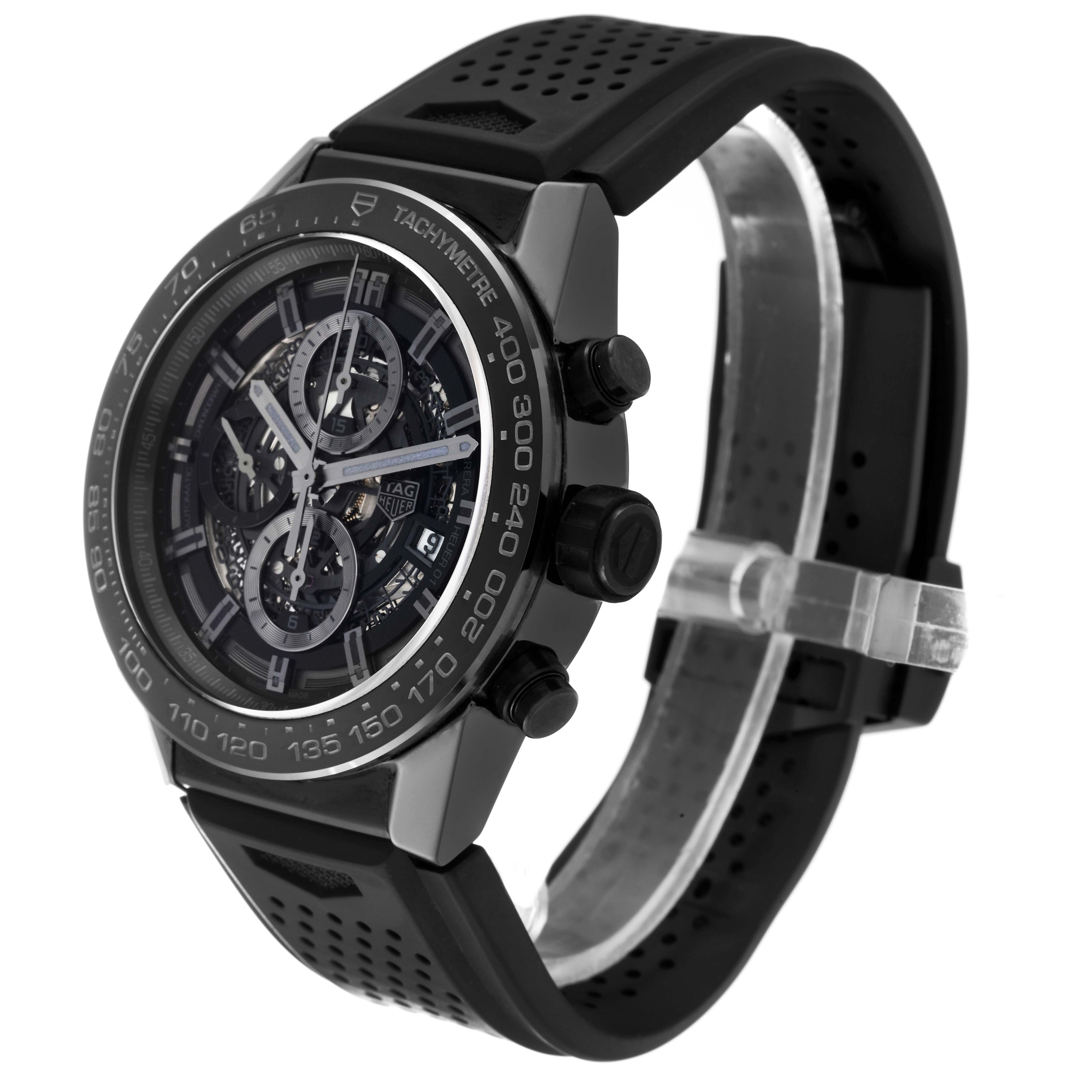 The image shows a side angle of a Tag Heuer Carrera CAR2A90.FT6071 Men's Ceramic Black Dial CAR2A90.FT6071 Men's Ceramic Black Dial watch, displaying its face, bezel, buttons, and perforated strap.