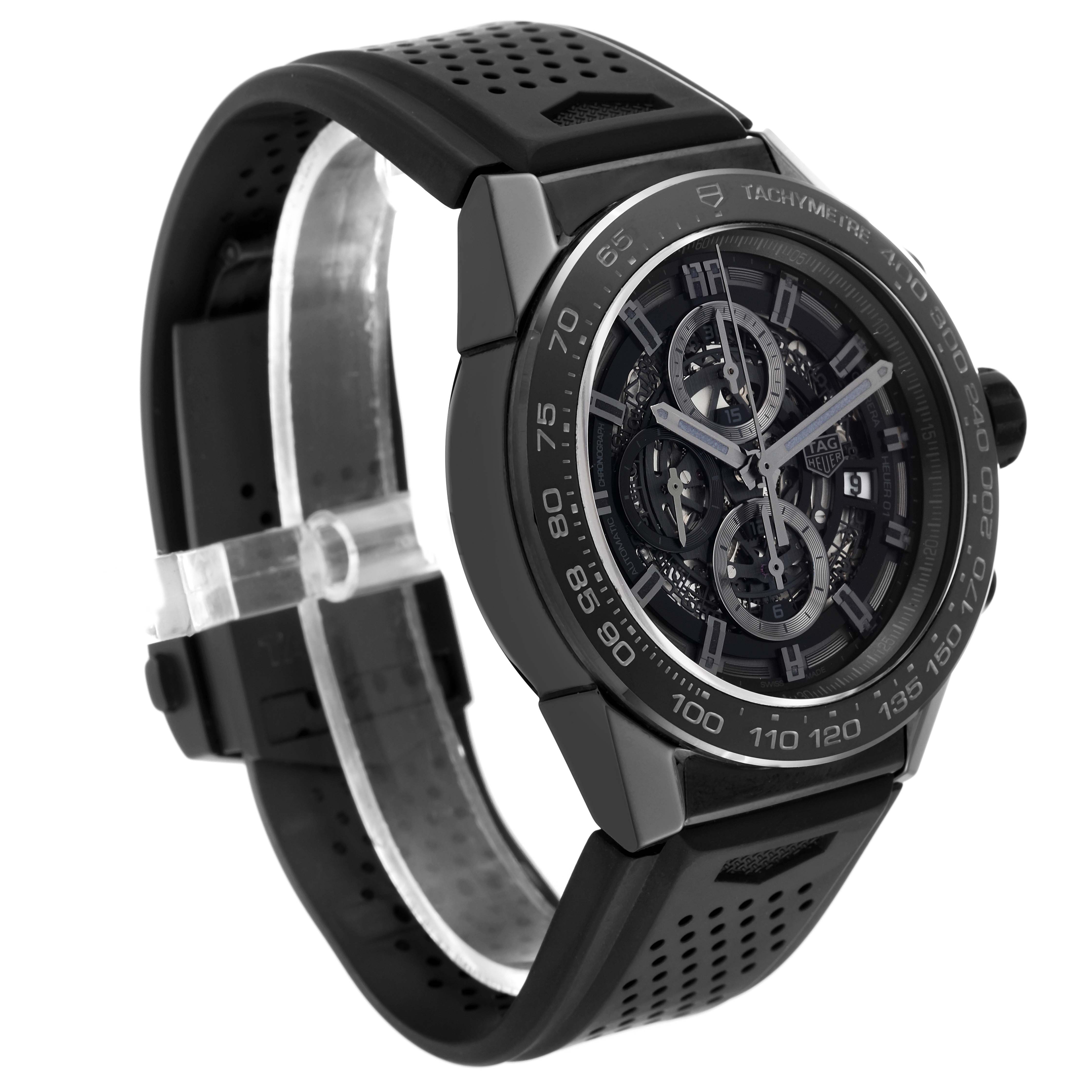 The Tag Heuer Carrera CAR2A90.FT6071 Men's Ceramic Black Dial CAR2A90.FT6071 Men's Ceramic Black Dial model watch is shown at a three-quarter angle, highlighting the dial, bezel, and black perforated strap.