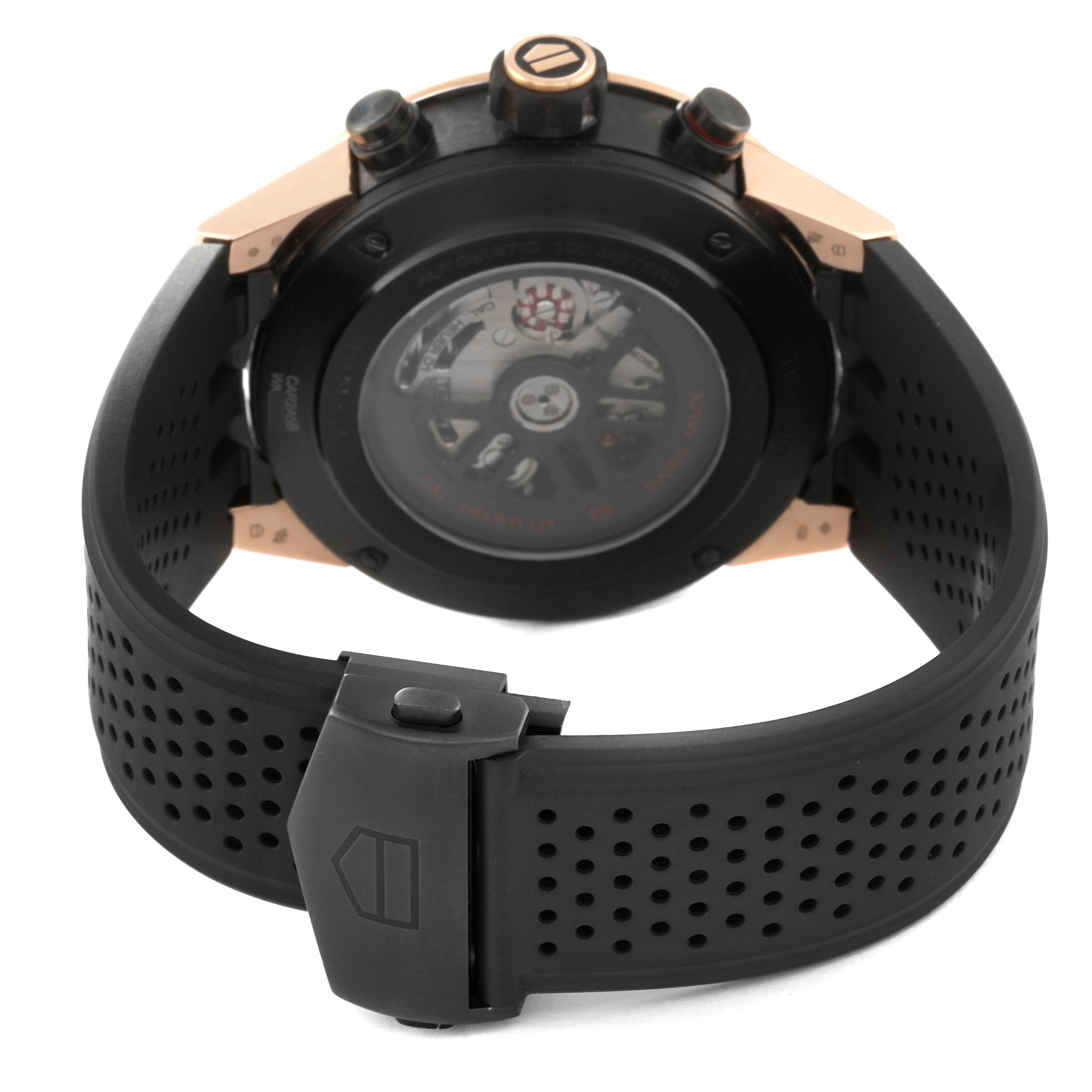 The image shows the back view of a Tag Heuer Carrera CAR2A5B Men's Titanium Black Dial CAR2A5B Men's Titanium Black Dial watch, highlighting the transparent case back and rubber strap.