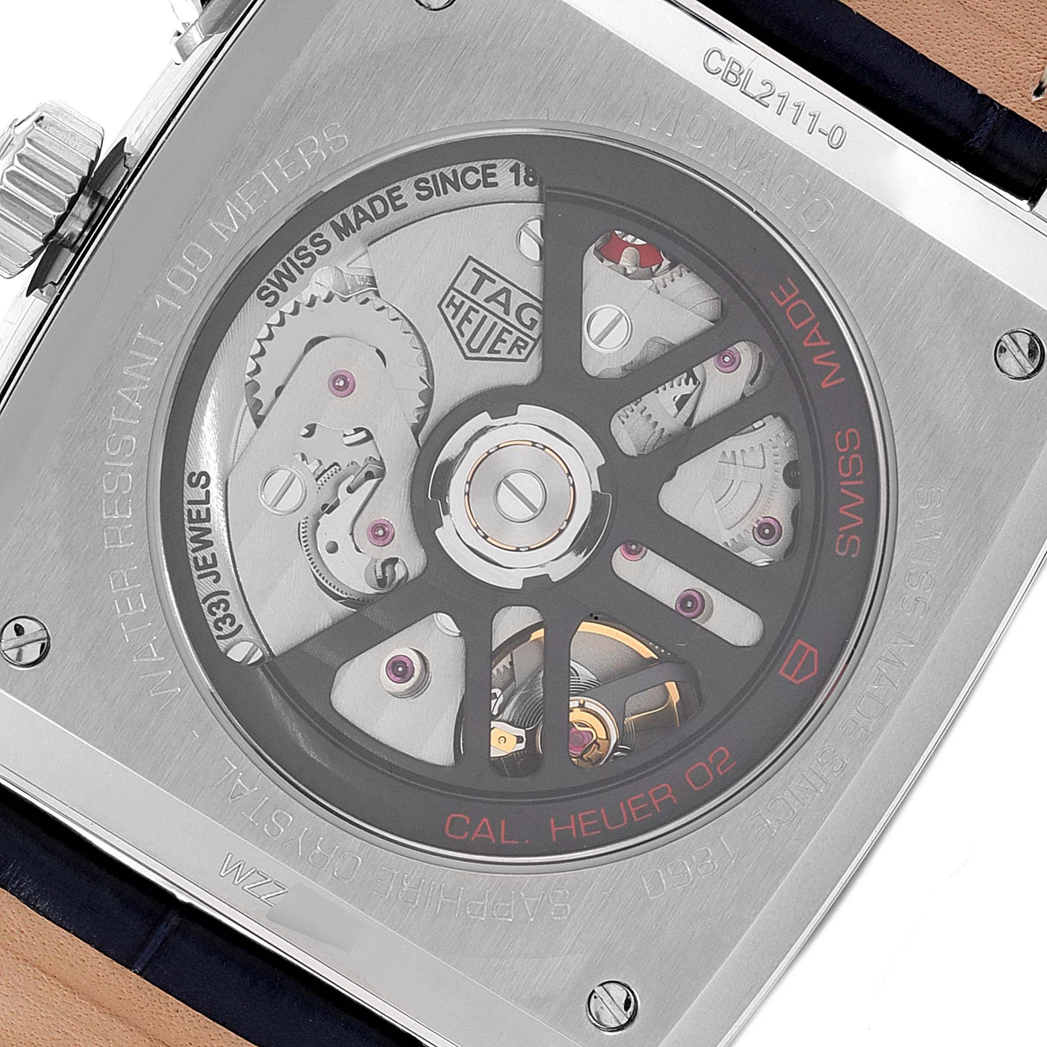 The image shows the back view of the Tag Heuer Monaco CBL2111.FC6453 Men's Stainless Steel Blue Dial CBL2111.FC6453 Men's Stainless Steel Blue Dial watch, highlighting its movement and sapphire crystal case back.