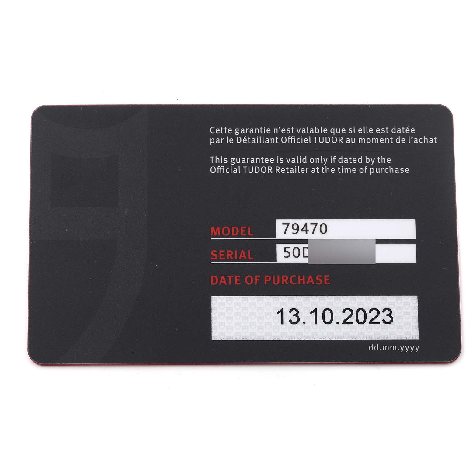 This image shows the warranty card for the Tudor Heritage Black Bay M79470 Men
s Stainless Steel Black Dial M79470 Men
s Stainless Steel Black Dial model 79470, displaying model, serial number, and purchase date.