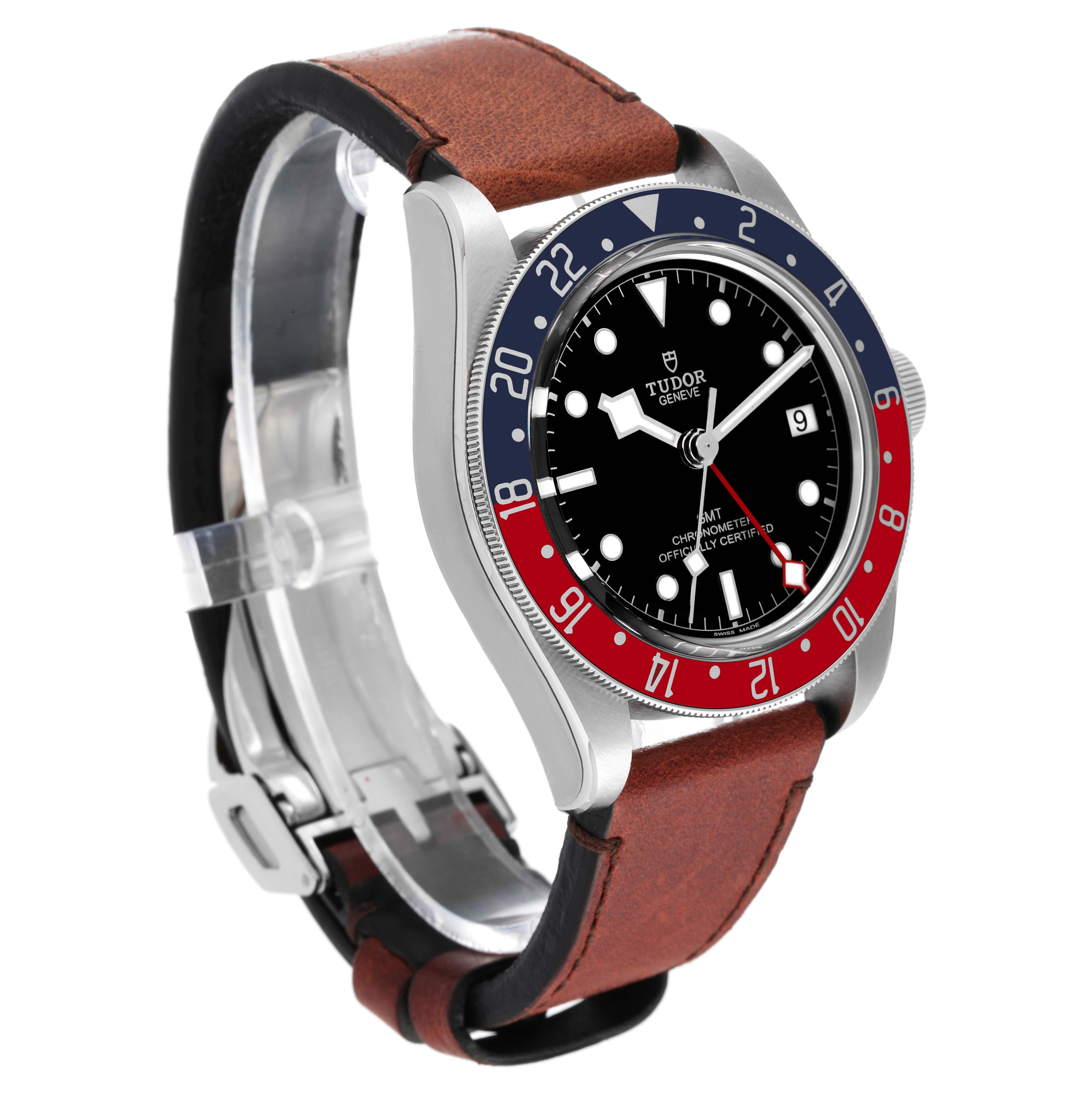 This image shows a Tudor Heritage Black Bay 79830RB Men
s Stainless Steel Black Dial 79830RB Men
s Stainless Steel Black Dial watch with a side angle, highlighting the face, bezel, crown, and brown leather strap.