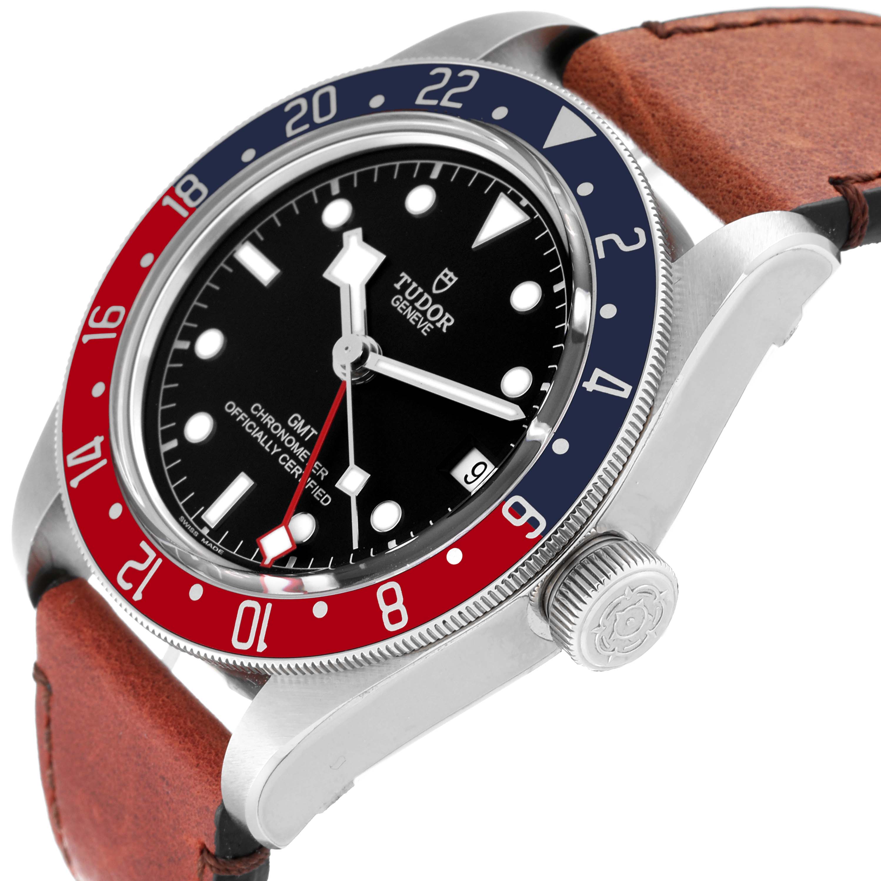 The image shows a close-up of a Tudor Heritage Black Bay 79830RB Men
s Stainless Steel Black Dial 79830RB Men
s Stainless Steel Black Dial watch at a side angle, highlighting its dial, bezel, and crown with the band partially visible.