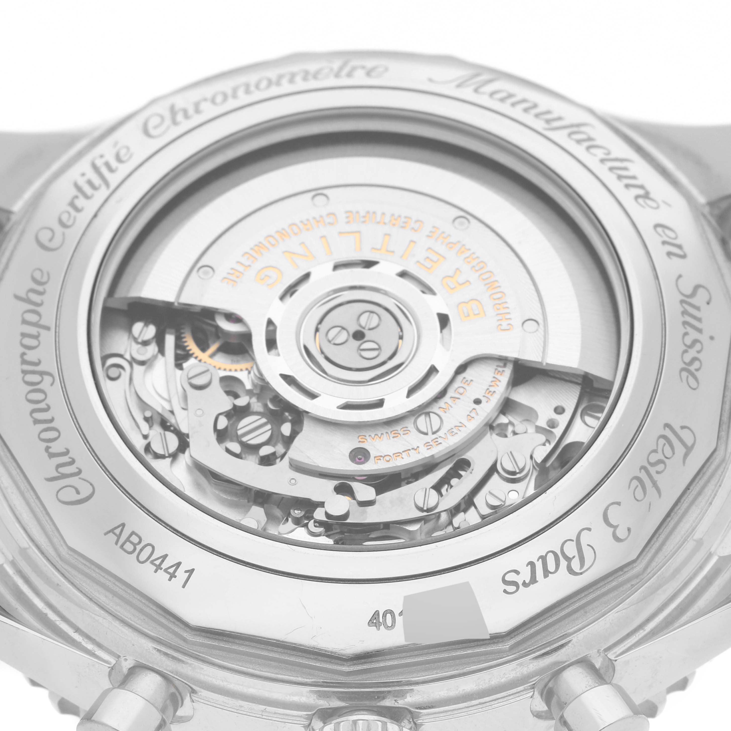 The image shows the back view of a Breitling Navitimer AB044121/BD24 Men
s Stainless Steel Black Dial AB044121/BD24 Men
s Stainless Steel Black Dial watch, displaying its intricate mechanical movement.