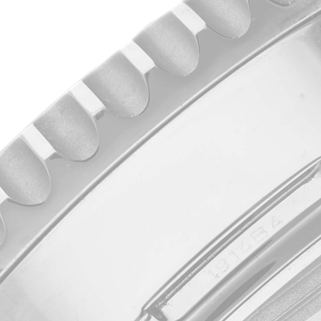 The image shows an up-close view of the bezel of a Breitling Navitimer AB044121/BD24 Men
s Stainless Steel Black Dial AB044121/BD24 Men
s Stainless Steel Black Dial watch.