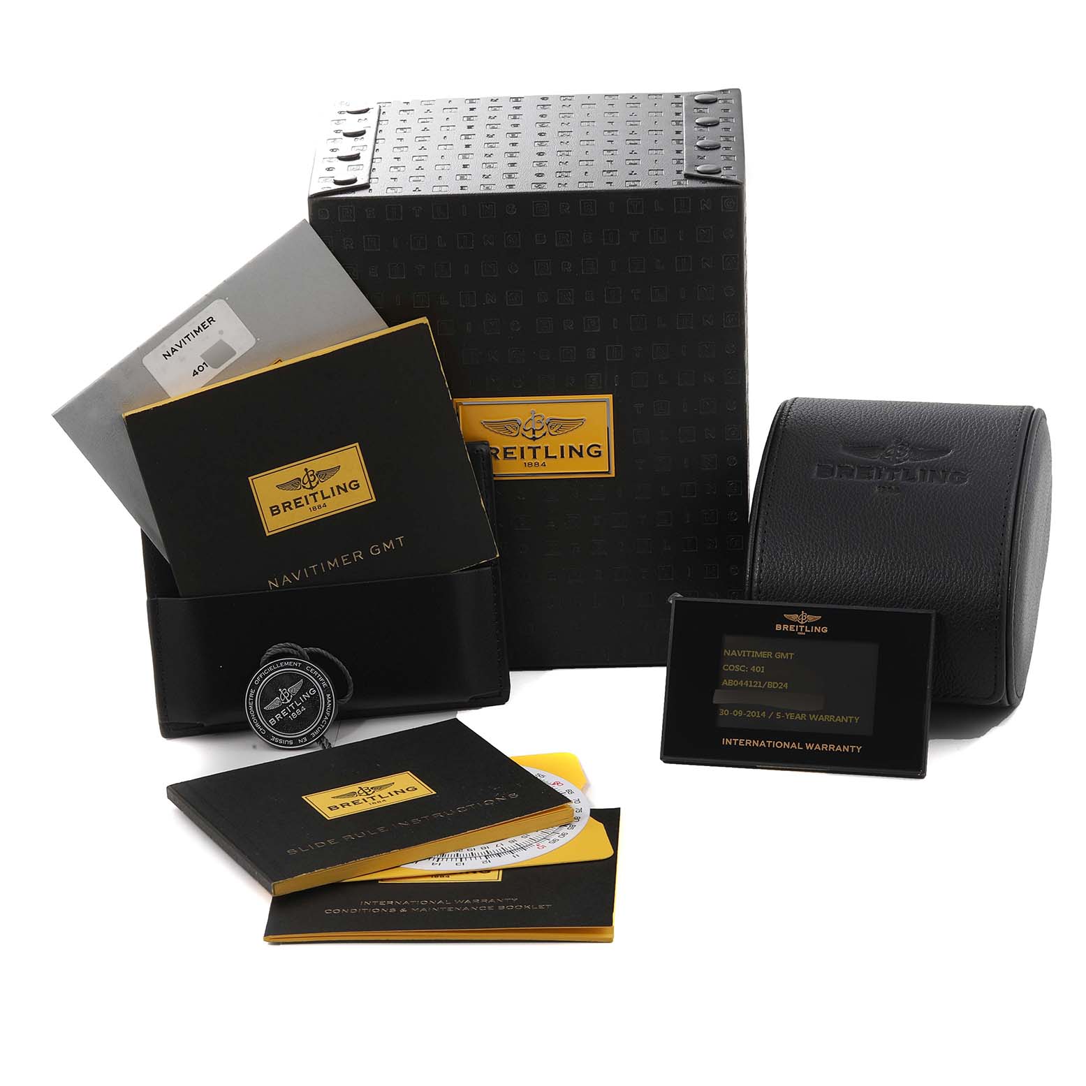 The image shows the Breitling Navitimer AB044121/BD24 Men
s Stainless Steel Black Dial AB044121/BD24 Men
s Stainless Steel Black Dial box, warranty cards, manuals, and a watch case from a front view.