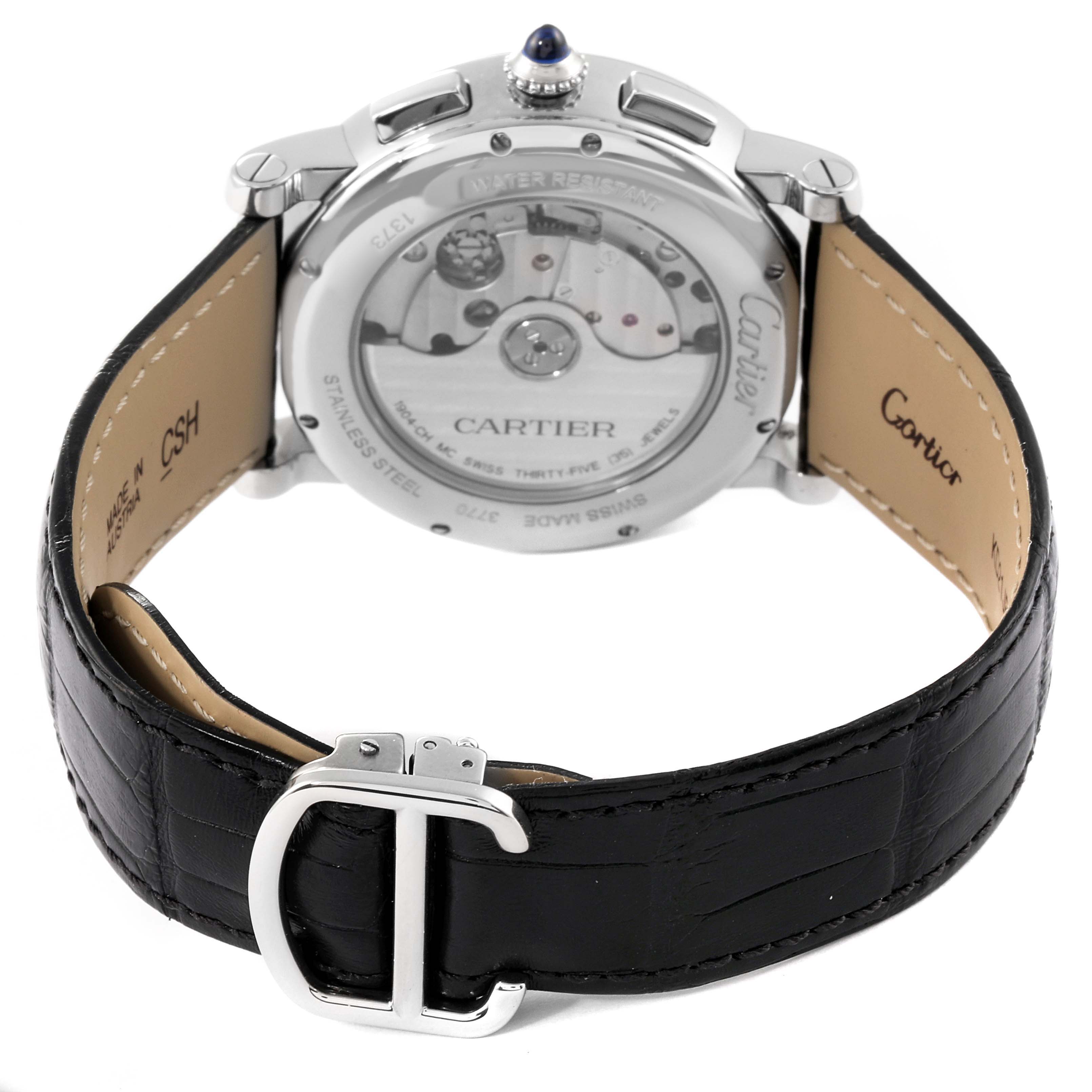 The image shows the back view of a Cartier Rotonde WSRO0002 Men's Stainless Steel Silver Dial WSRO0002 Men's Stainless Steel Silver Dial watch, highlighting its movement, sapphire crown, and black leather strap.
