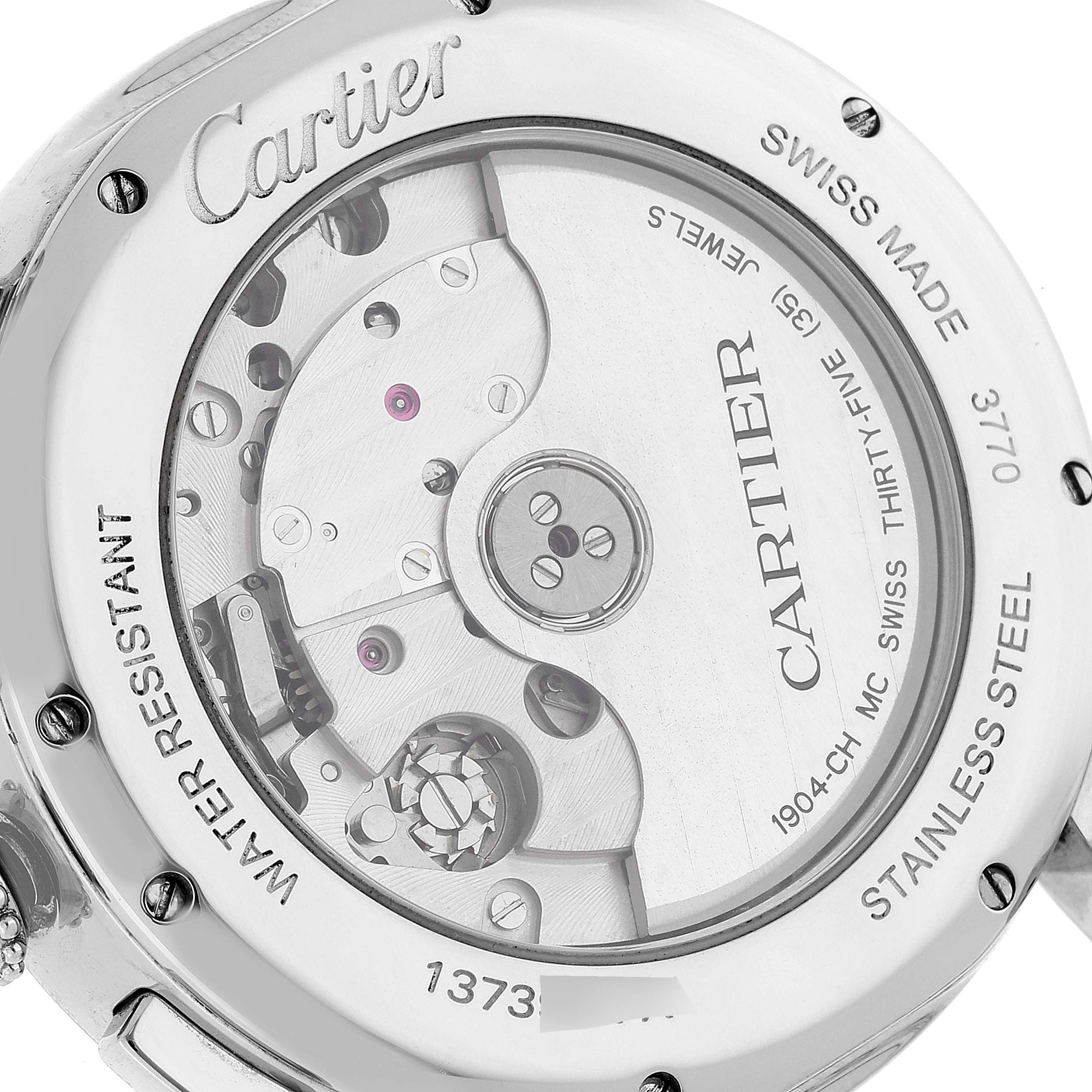 The image shows the caseback of a Cartier Rotonde WSRO0002 Men's Stainless Steel Silver Dial WSRO0002 Men's Stainless Steel Silver Dial watch, revealing its internal mechanism and engravings.