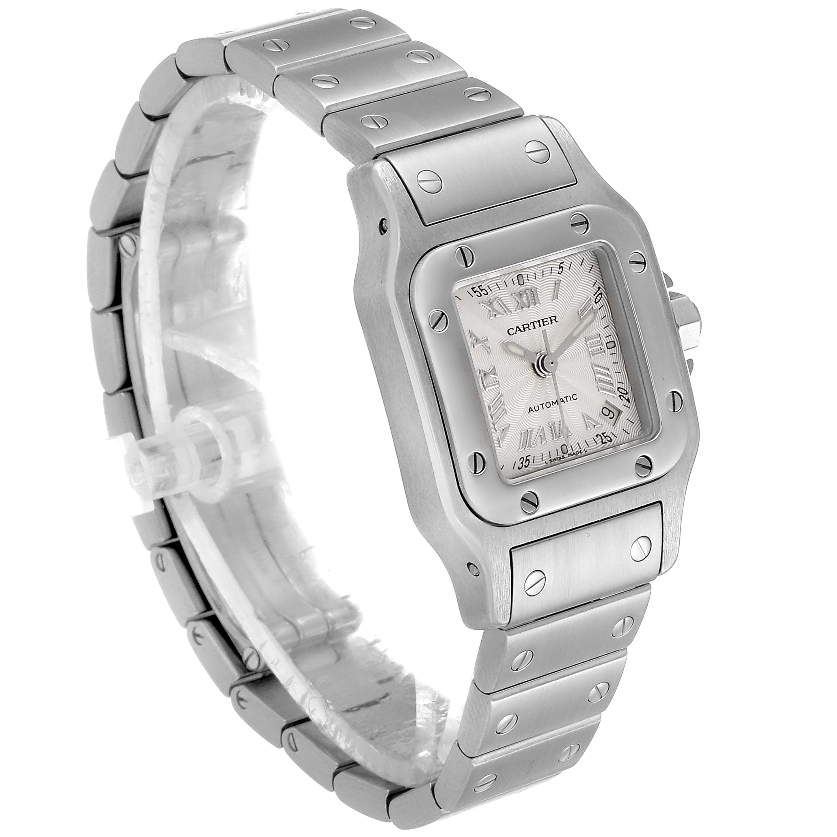This image shows a Cartier Santos W20044D6 Women
s Stainless Steel Silver Dial W20044D6 Women
s Stainless Steel Silver Dial watch from a slightly elevated side angle, highlighting the face, bezel, and bracelet.