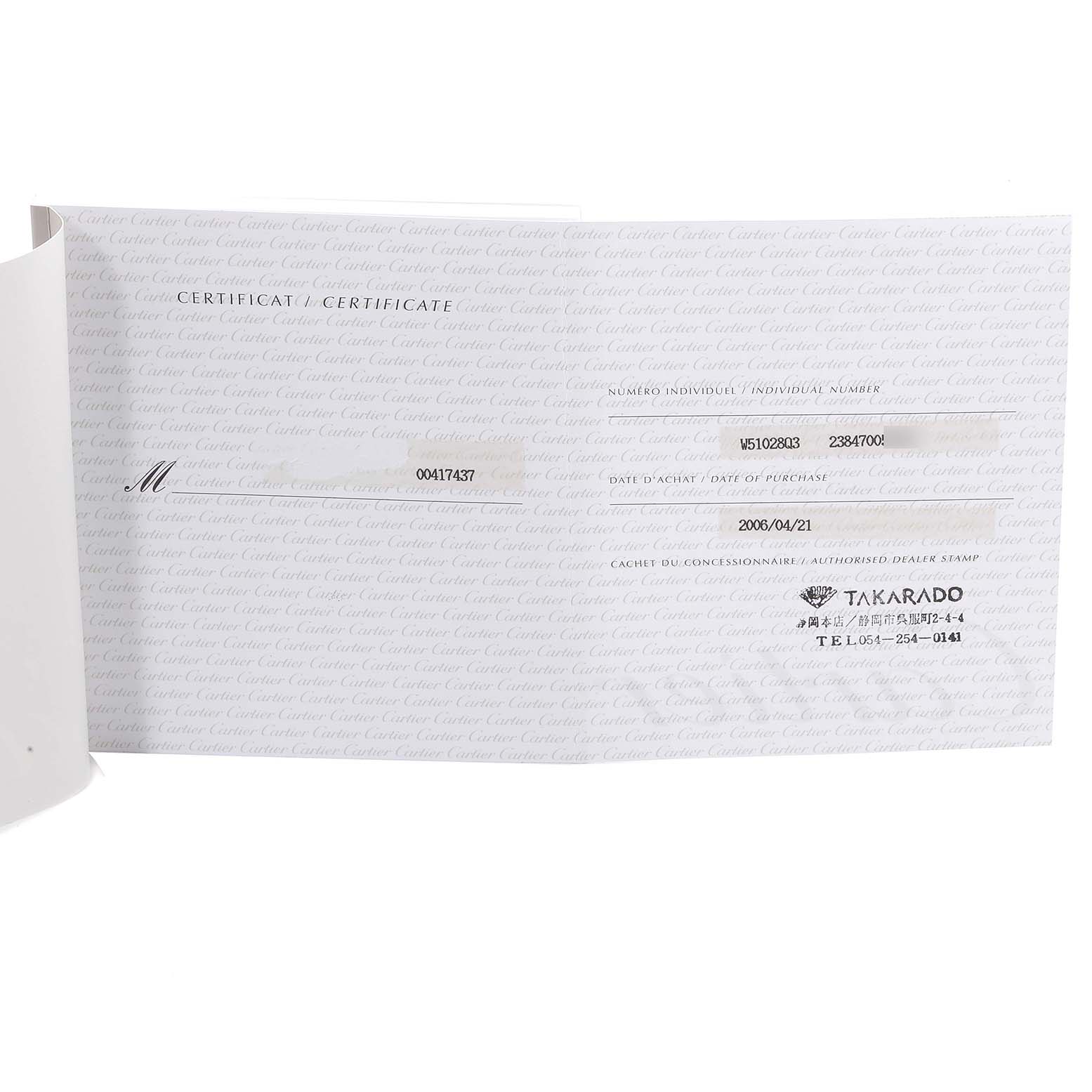 The image shows the certificate for a Cartier Tank Française watch, displaying purchase date, serial numbers, and dealer stamp.