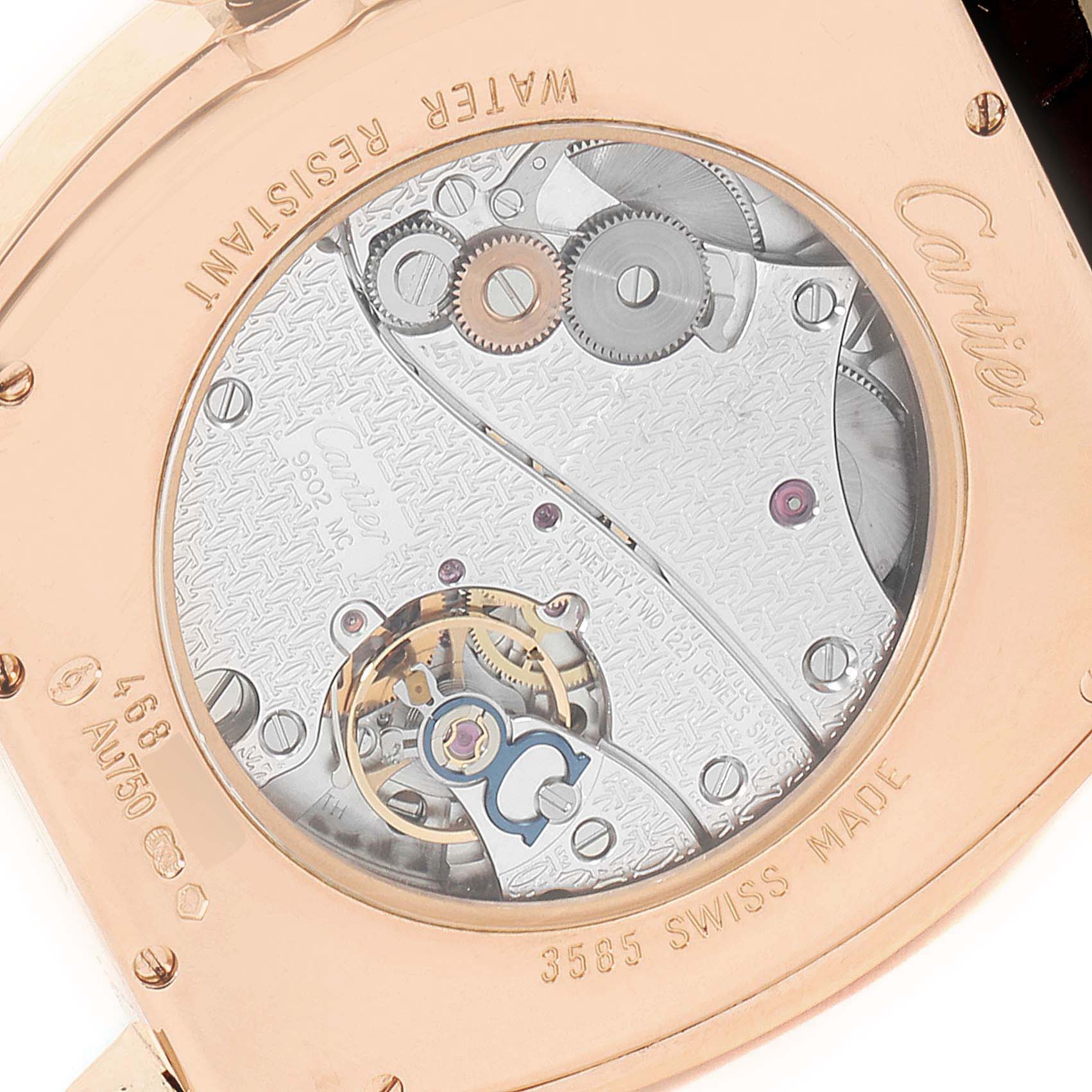 The image shows the back view of the Cartier Tortue W1556234 Men's Rose Gold Silver Dial W1556234 Men's Rose Gold Silver Dial watch, highlighting the movement and mechanical parts.