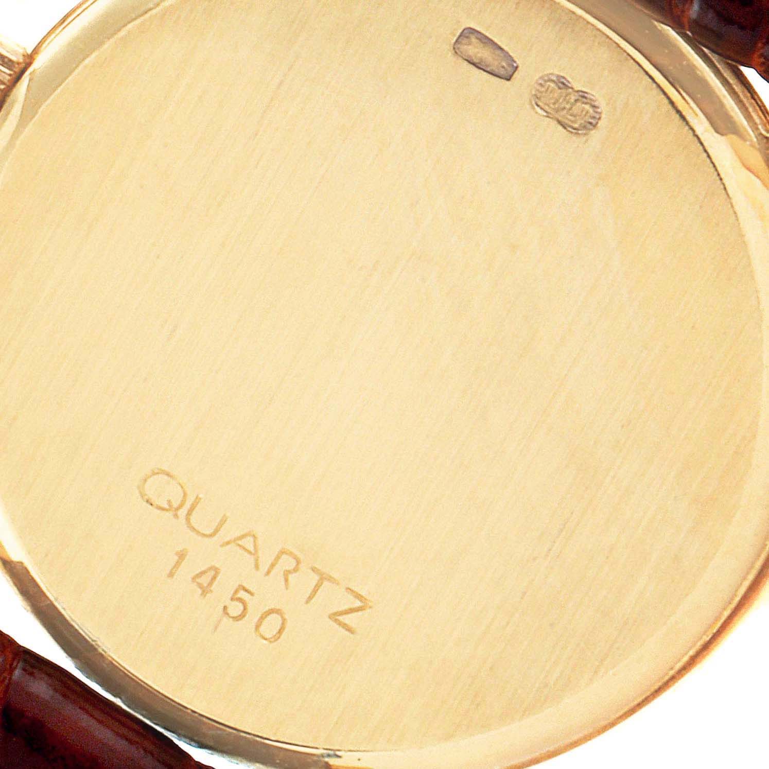 This image shows the back of the Omega 1450 Women's Yellow Gold Champagne Dial 1450 Women's Yellow Gold Champagne Dial DeVille Mini Yellow Gold Diamond Cocktail Ladies Watch 1450 Unworn model, with the text "QUARTZ 1450”.