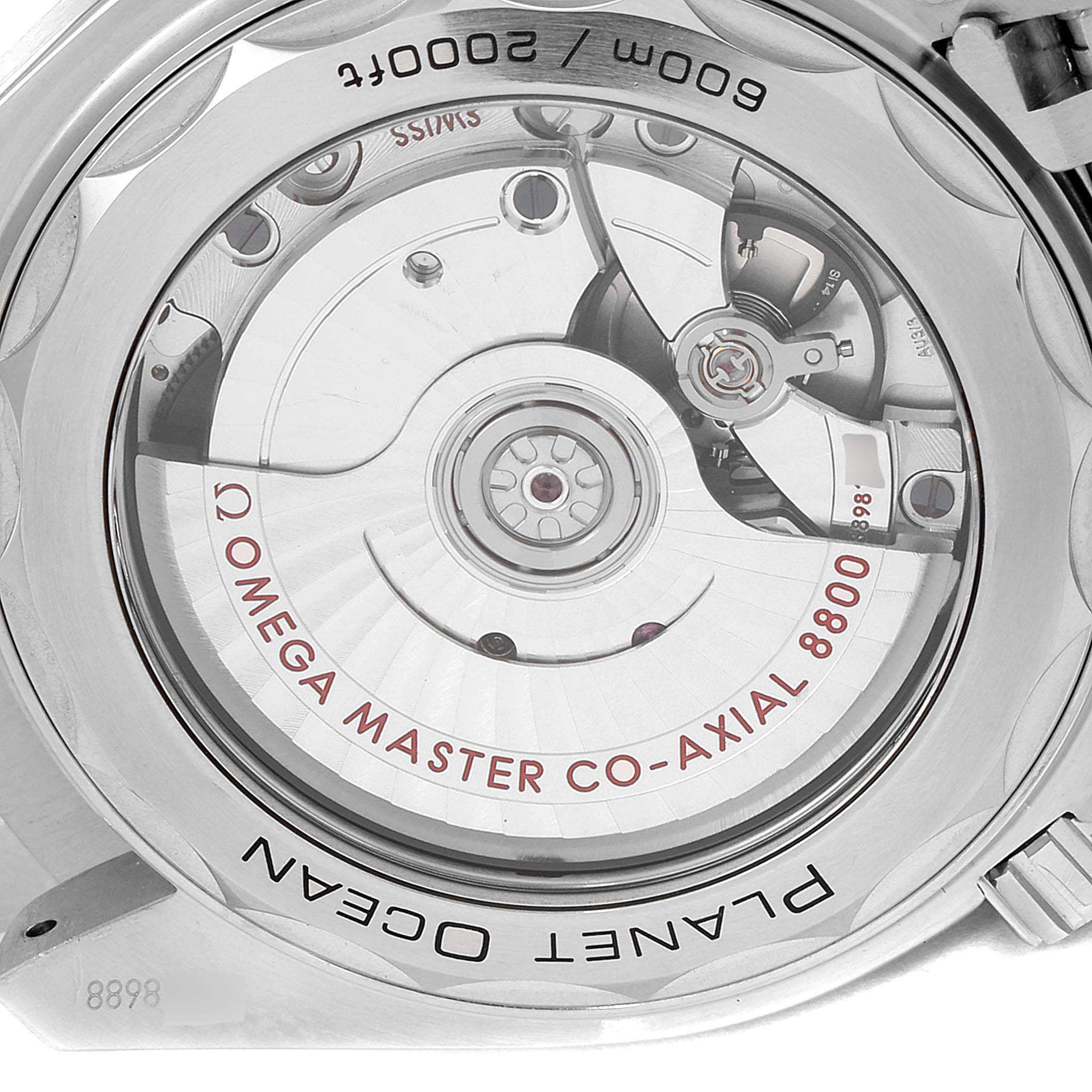 The image shows the back view of the Omega Planet Ocean 215.30.40.20.03.001 Men
s Stainless Steel Blue Dial 215.30.40.20.03.001 Men
s Stainless Steel Blue Dial watch, highlighting the Omega Master Co-Axial 8800 movement.