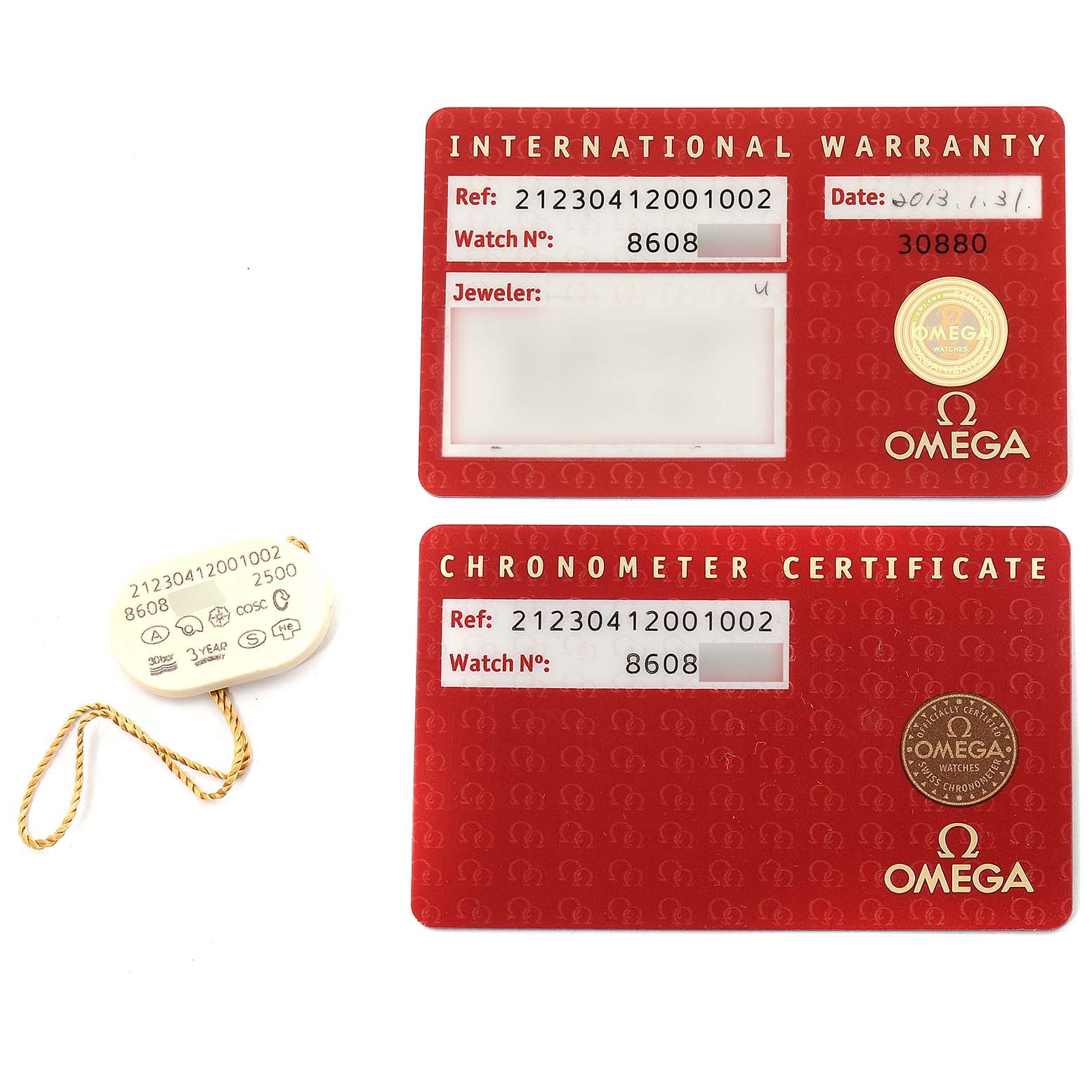 This image shows the international warranty card, chronometer certificate, and a tag for the Omega Seamaster 212.30.41.20.01.002 Men
s Stainless Steel Black Dial 212.30.41.20.01.002 Men
s Stainless Steel Black Dial model.