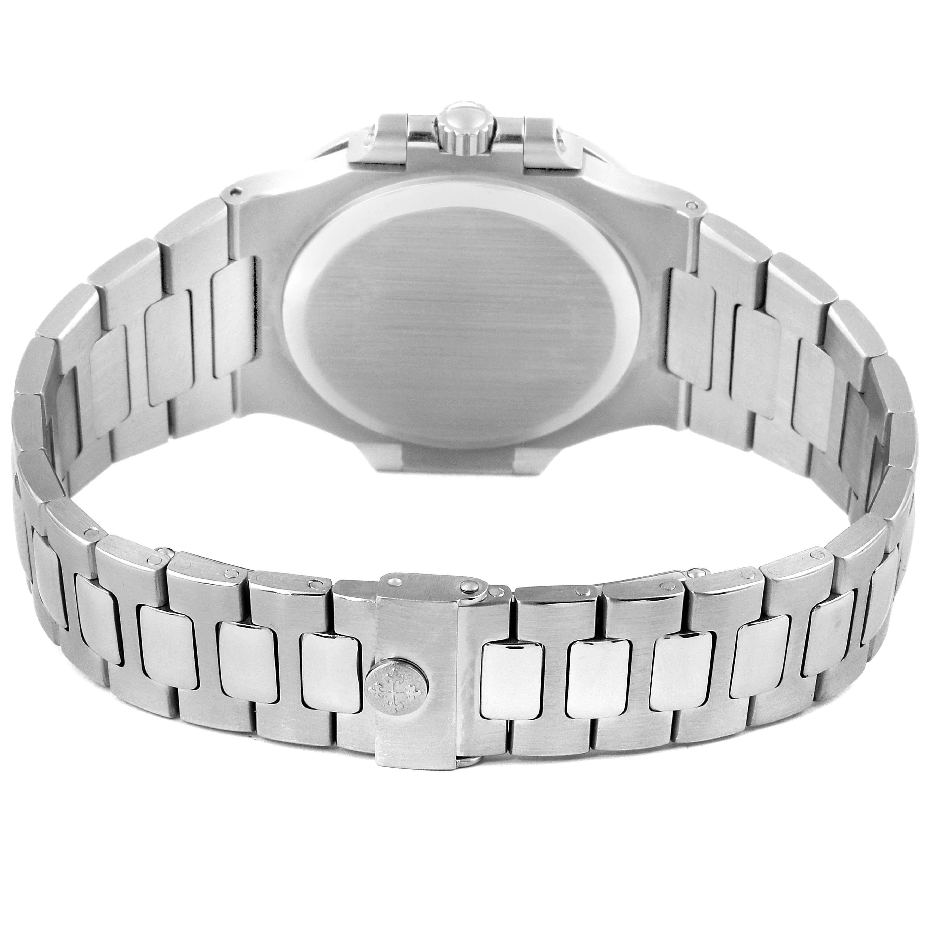 This image shows the back view of a Patek Philippe Nautilus 3800/1 Men's Stainless Steel Black Dial 3800/1 Men's Stainless Steel Black Dial watch, highlighting its case back, crown, and metal bracelet.
