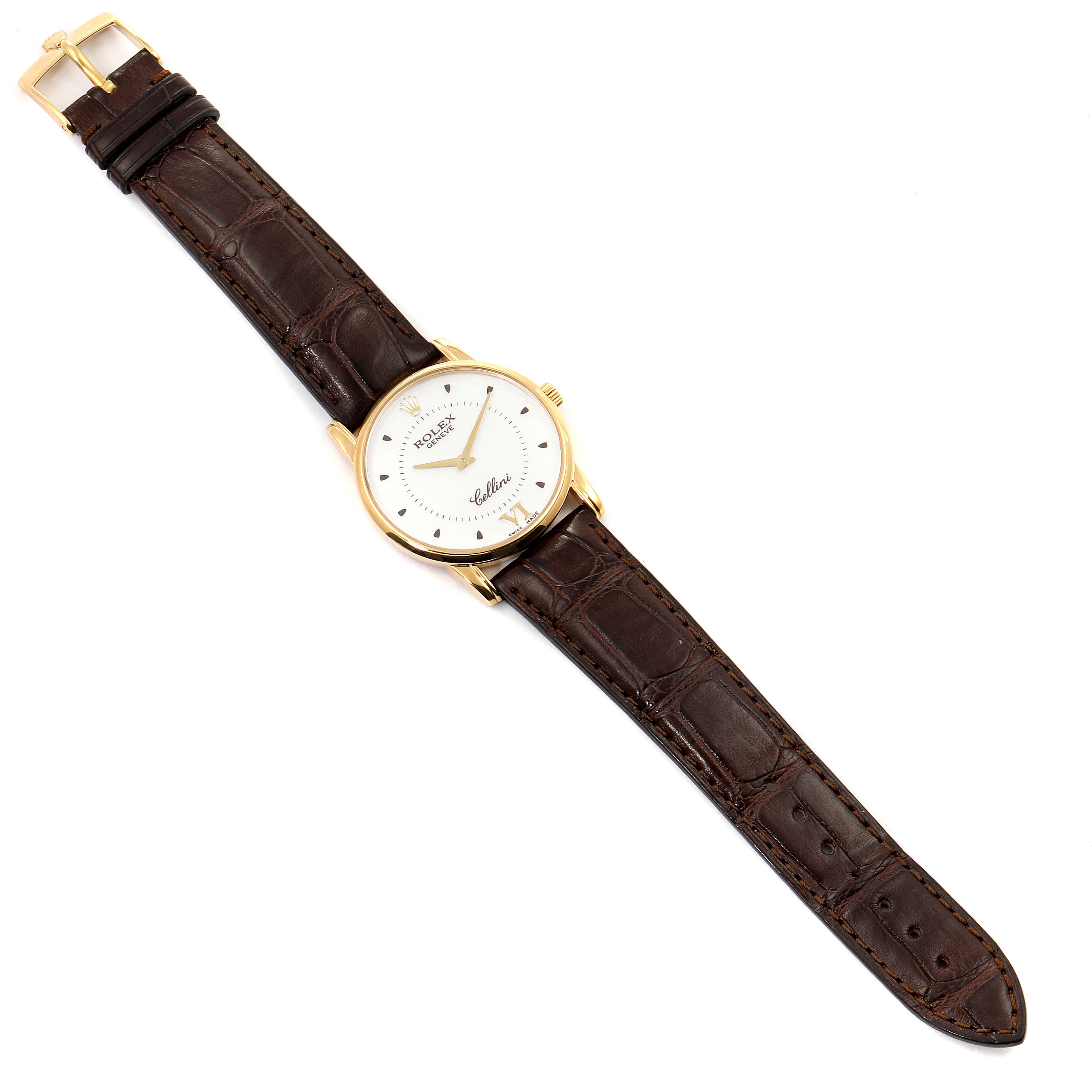 The image shows a top-down view of a Rolex Cellini 5116 Men's Yellow Gold Silver Dial 5116 Men's Yellow Gold Silver Dial watch with a brown leather strap and a gold case.