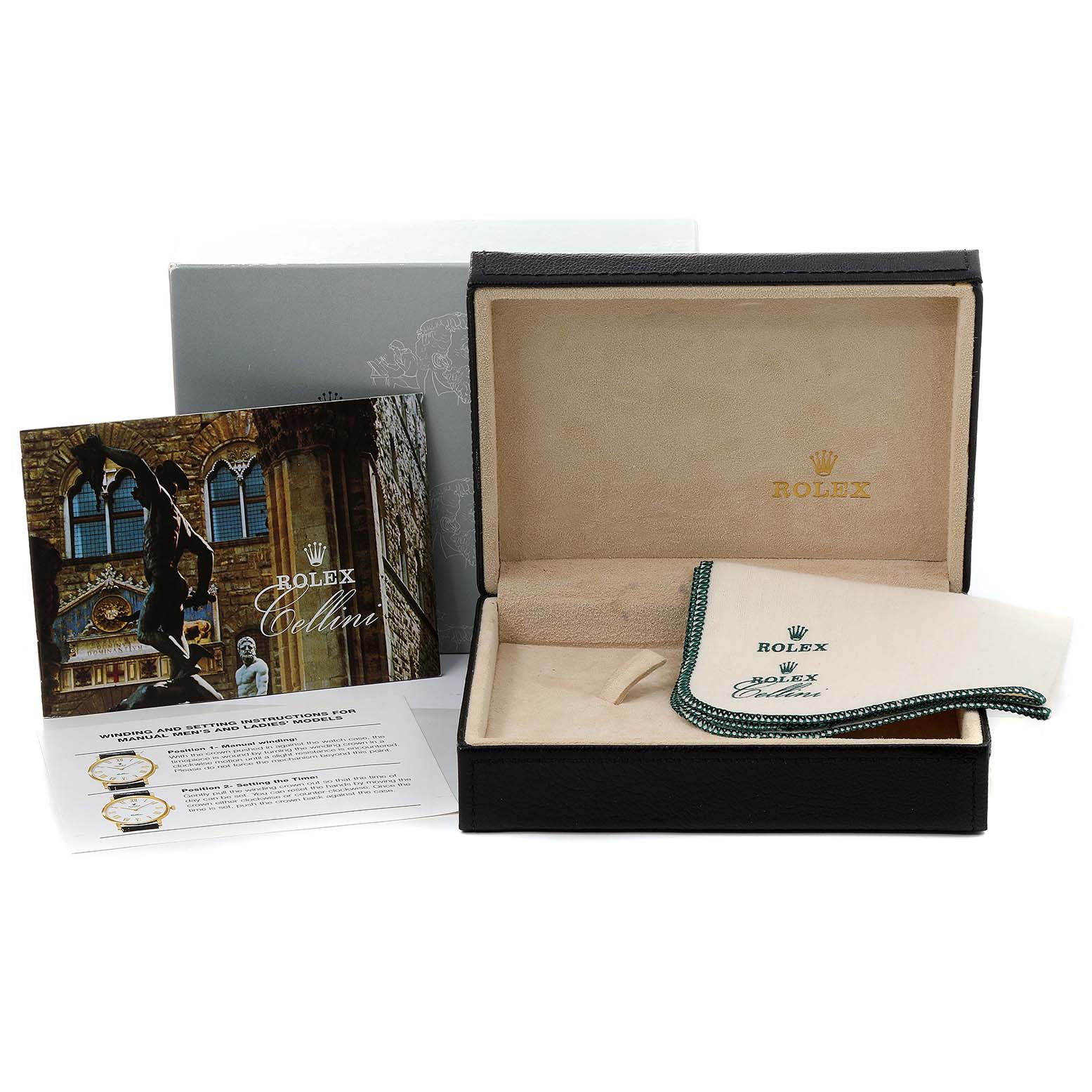 The image shows a Rolex Cellini 5116 Men's Yellow Gold Silver Dial 5116 Men's Yellow Gold Silver Dial watch box, manual, and cleaning cloth from a front-facing angle.