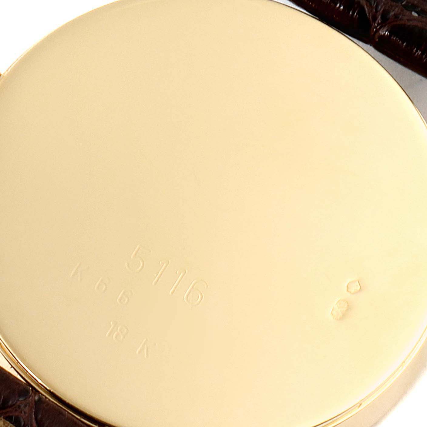 This image shows the case back of a Rolex Cellini 5116 Men's Yellow Gold Silver Dial 5116 Men's Yellow Gold Silver Dial model watch.