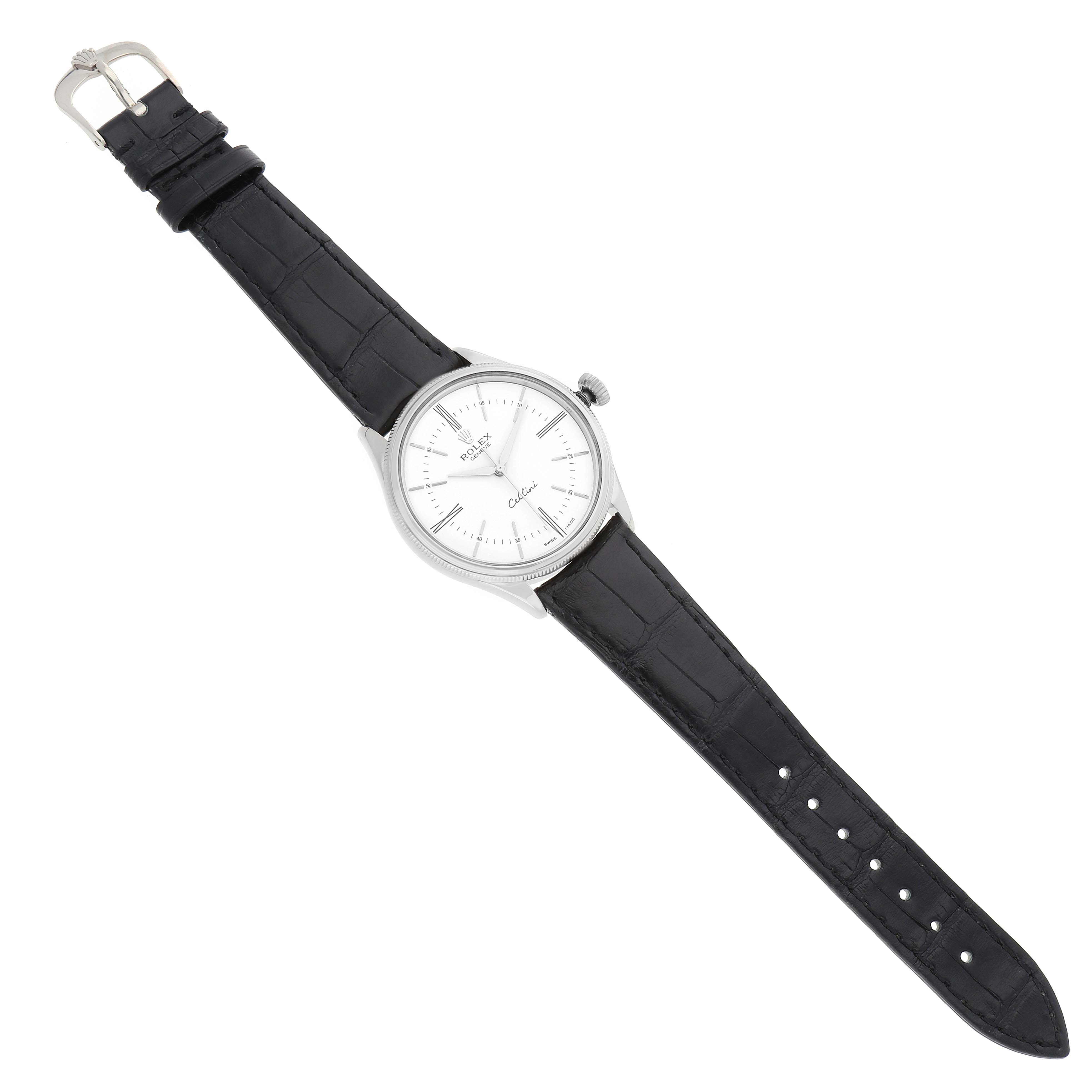 The Rolex Cellini 50509 Men's White Gold White Dial watch is shown from a top-down angle, displaying its entire face, case, and black leather strap.