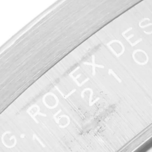 This close-up image shows the engraved text on the inner bezel of a Rolex Date 15210 Men's Stainless Steel Black Dial 15210 Men's Stainless Steel Black Dial model watch.