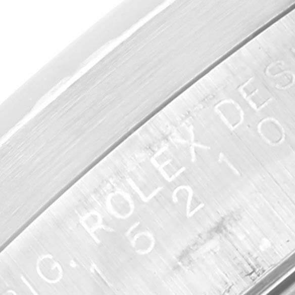 This image shows a close-up of the engraved inner bezel of a Rolex Date 15210 Men's Stainless Steel Blue Dial 15210 Men's Stainless Steel Blue Dial model watch.
