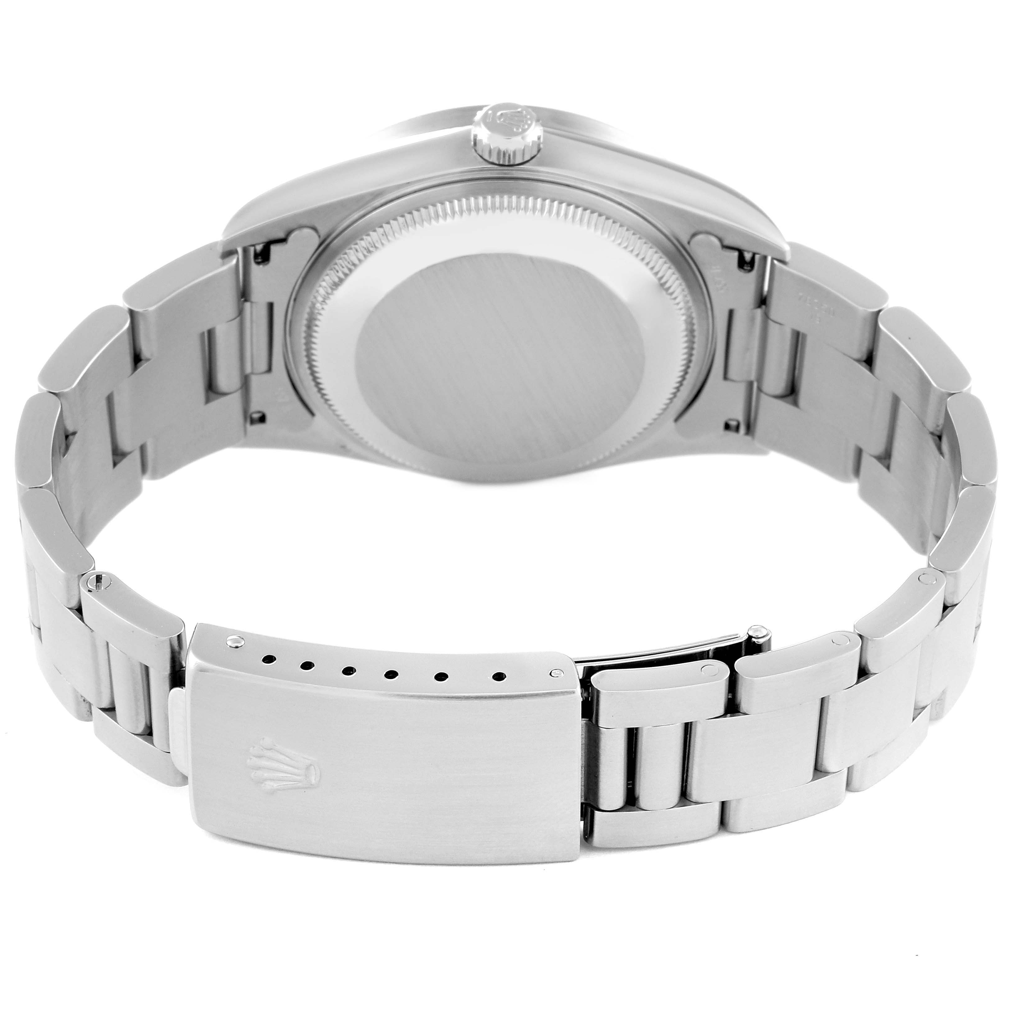 The image shows the back view of the Rolex Date 15210 Men's Stainless Steel Blue Dial 15210 Men's Stainless Steel Blue Dial model watch, highlighting its clasp, bracelet, and case.