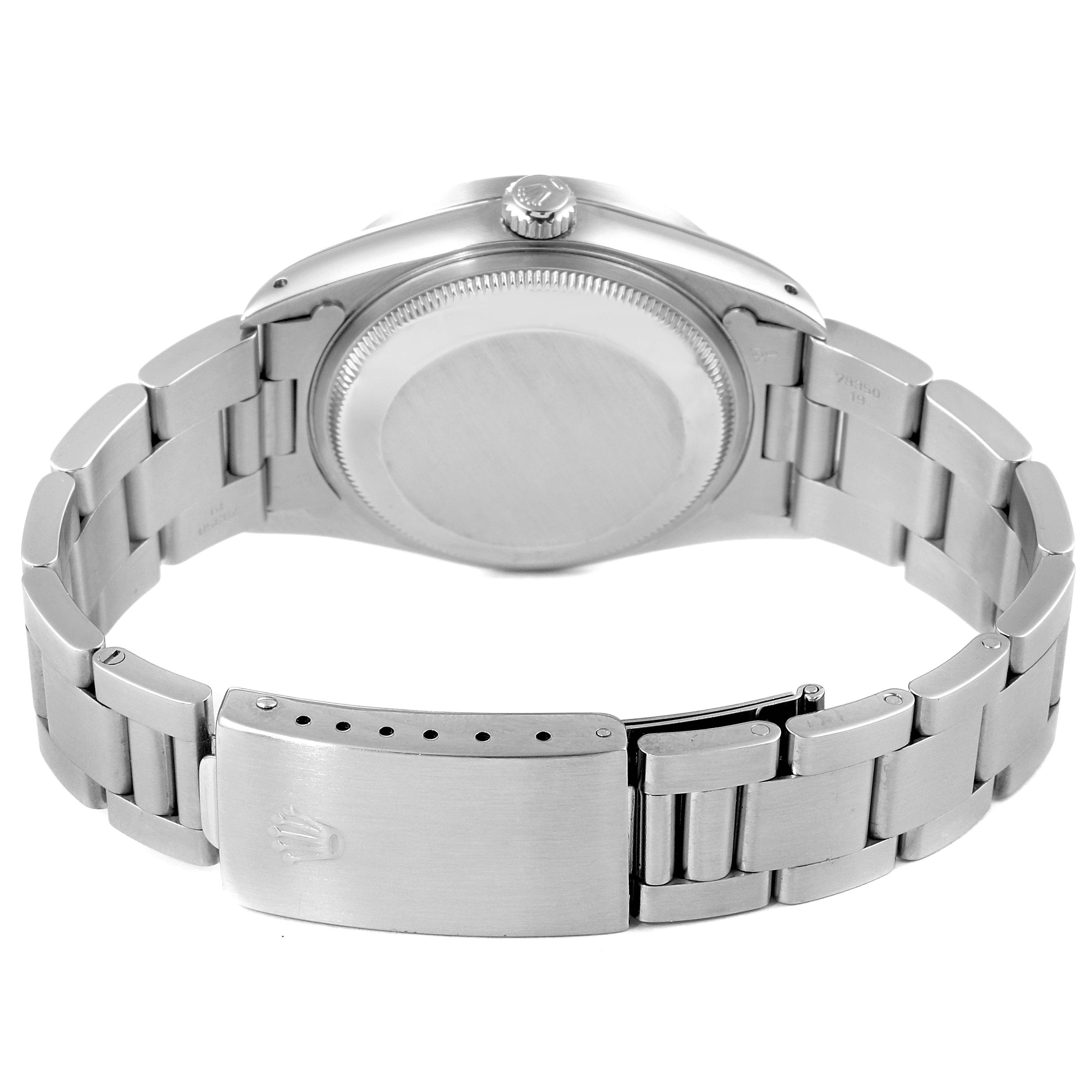 The image shows the back and bracelet of a Rolex Date 15210 Men's Stainless Steel White Dial 15210 Men's Stainless Steel White Dial model watch, highlighting the case back and clasp.