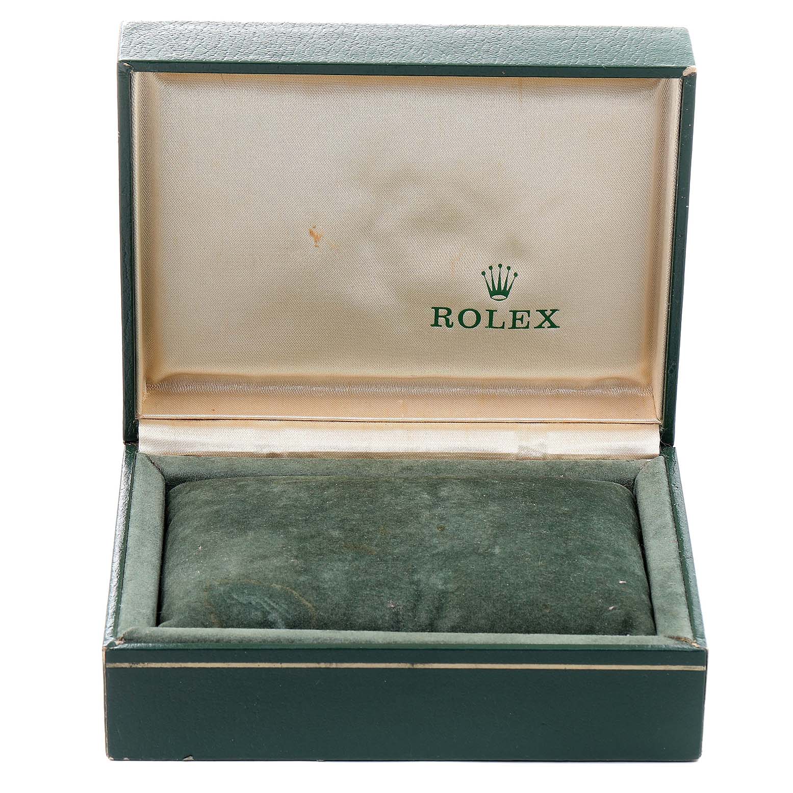 The image shows an open green Rolex Datejust 69173 Women
s Steel and Gold (two tone) Champagne Dial 69173 Women
s Steel and Gold (two tone) Champagne Dial watch box without the watch, viewed from the front.