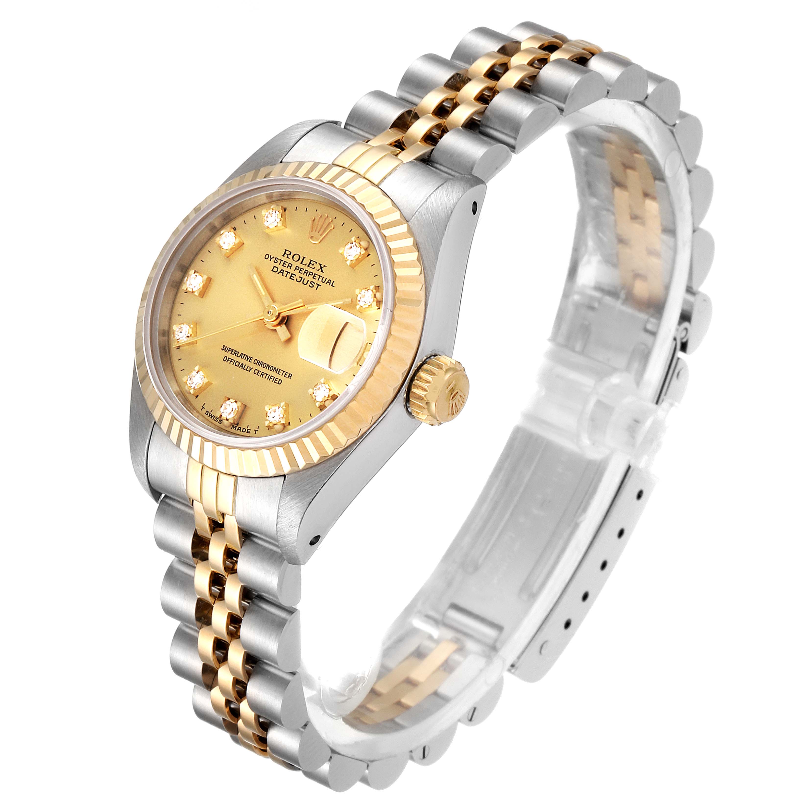 The Rolex Datejust 69173 Women
s Steel and Gold (two tone) Champagne Dial 69173 Women
s Steel and Gold (two tone) Champagne Dial watch is shown from an angle displaying the dial, crown, and two-tone bracelet.