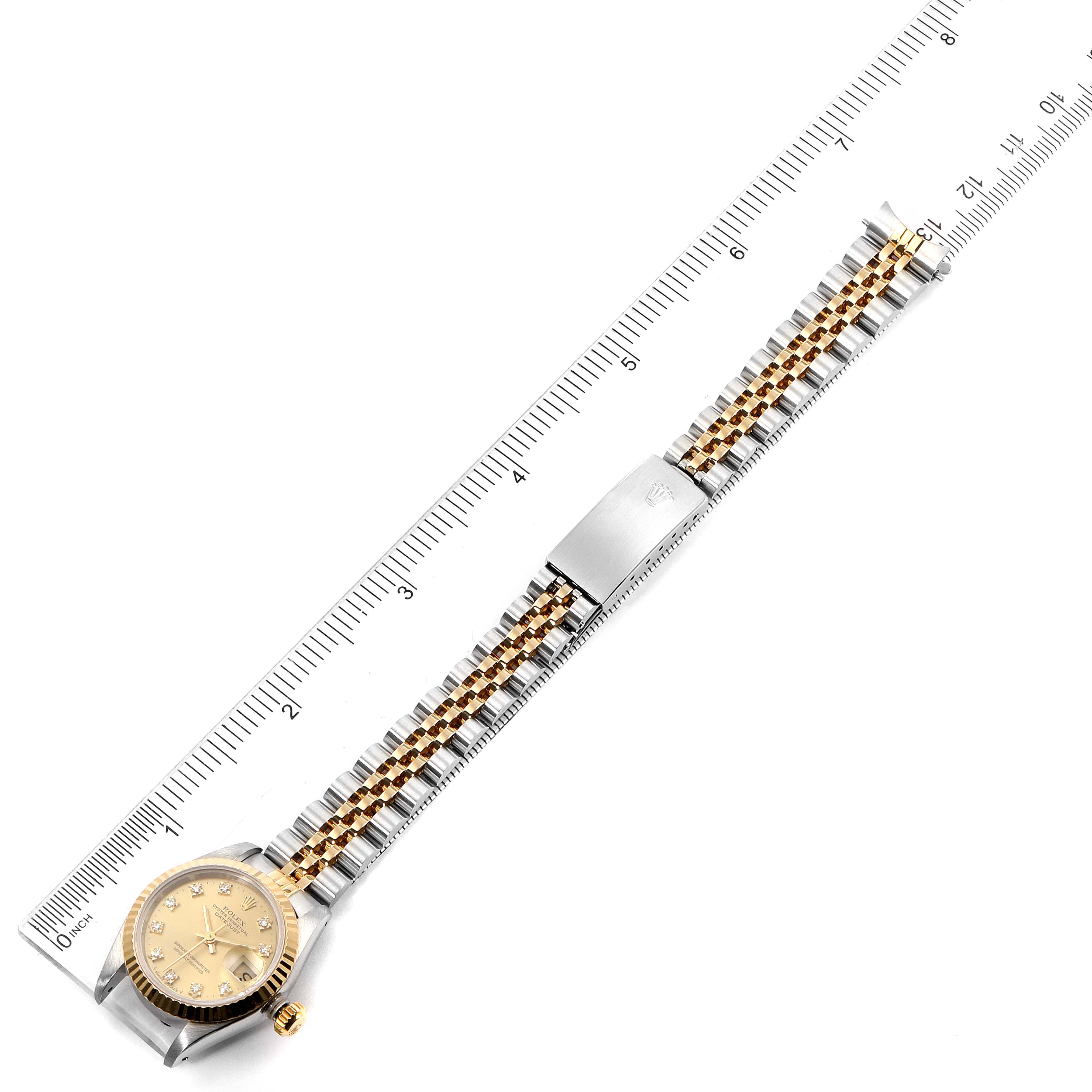 The Rolex Datejust 69173 Women
s Steel and Gold (two tone) Champagne Dial 69173 Women
s Steel and Gold (two tone) Champagne Dial watch is shown fully extended, lying flat with the dial, bezel, bracelet, and clasp in view.