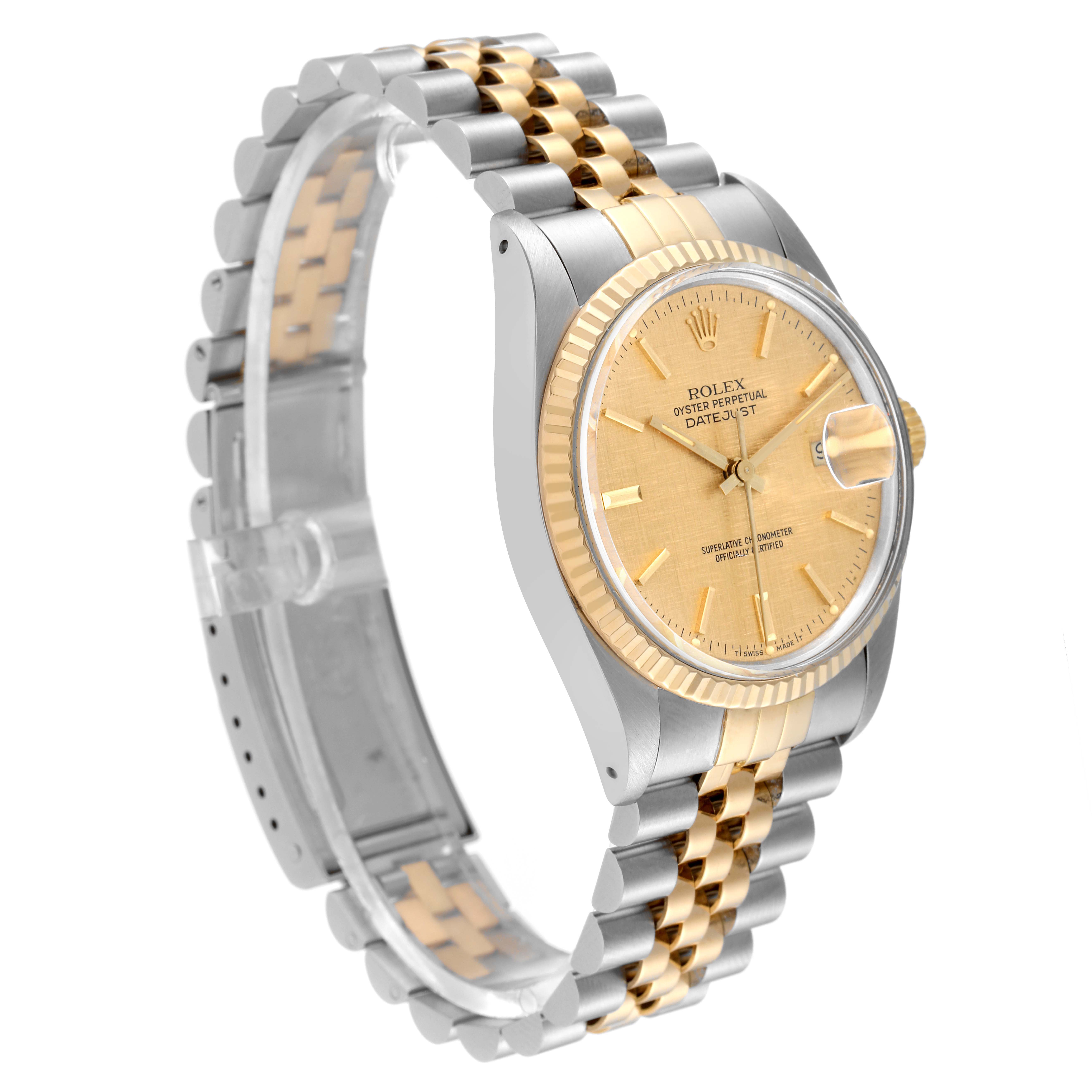 The image shows a Rolex Datejust 16013 Men's Steel and Gold (two tone) Champagne Dial 16013 Men's Steel and Gold (two tone) Champagne Dial watch from a side angle, highlighting its two-tone bracelet, dial, and fluted bezel.