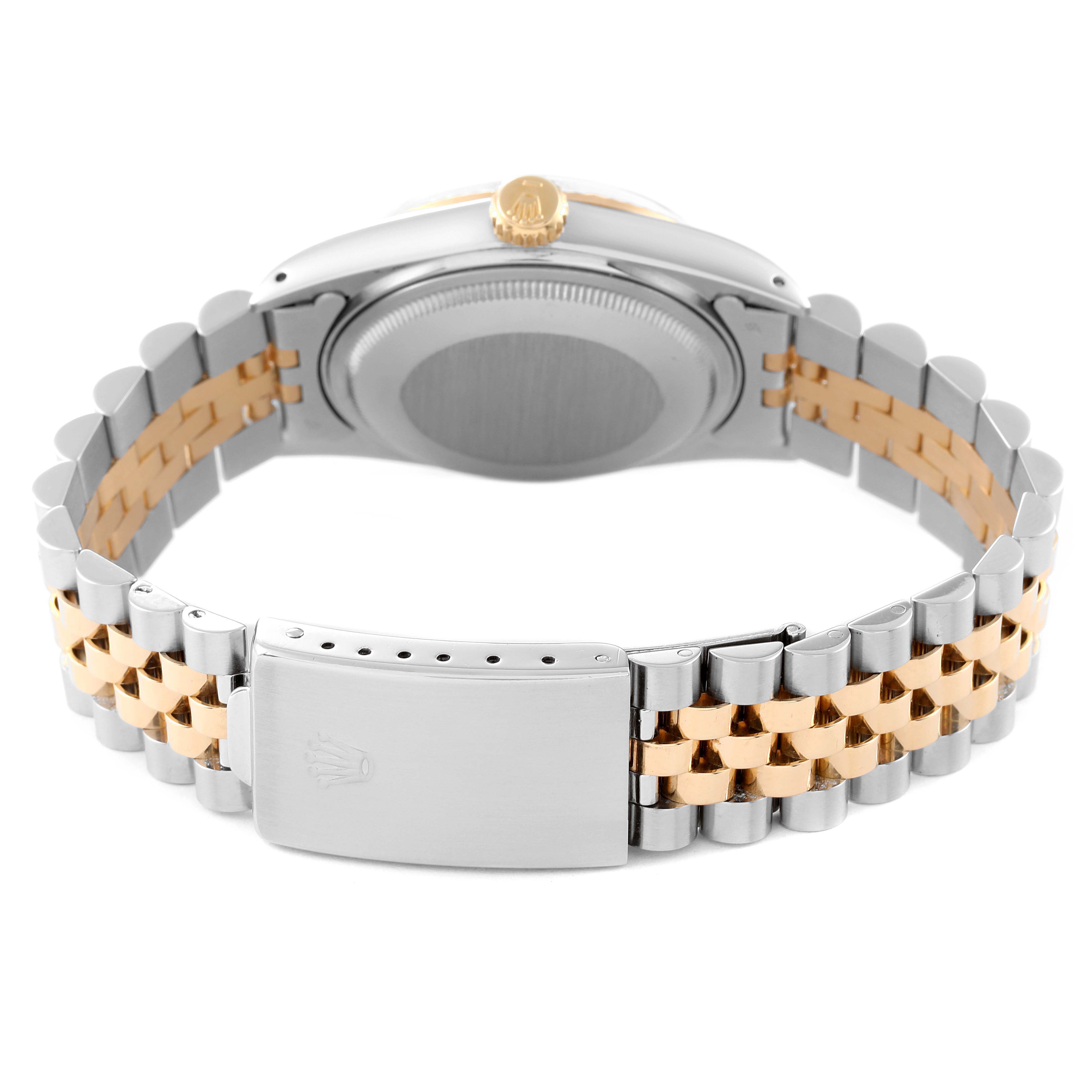 The image shows the back view of a Rolex Datejust 16013 Men's Steel and Gold (two tone) Champagne Dial 16013 Men's Steel and Gold (two tone) Champagne Dial watch, highlighting the clasp and bracelet links in a two-tone design.