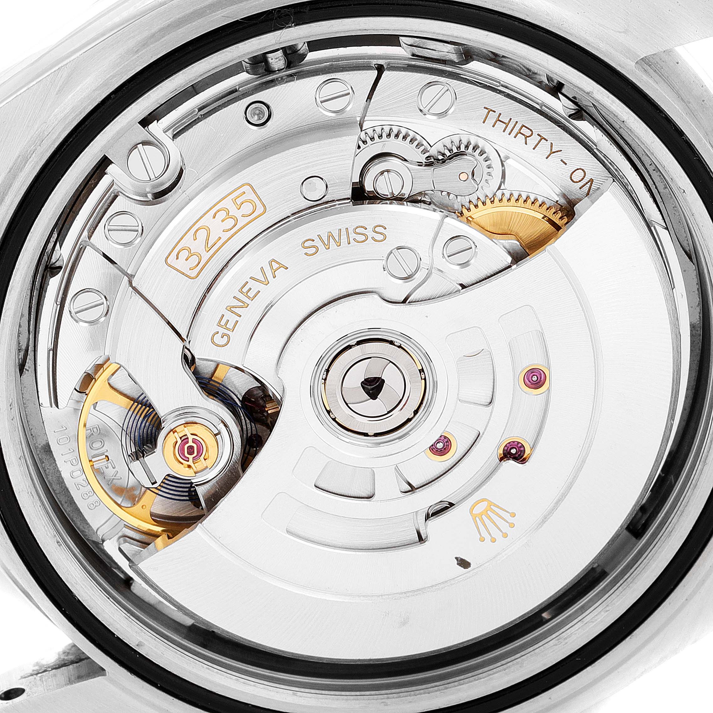 This image shows the movement mechanism and inner components of a Rolex Datejust 41 126300 Men's Stainless Steel Grey Dial 126300 Men's Stainless Steel Grey Dial watch, including the rotor and gears.