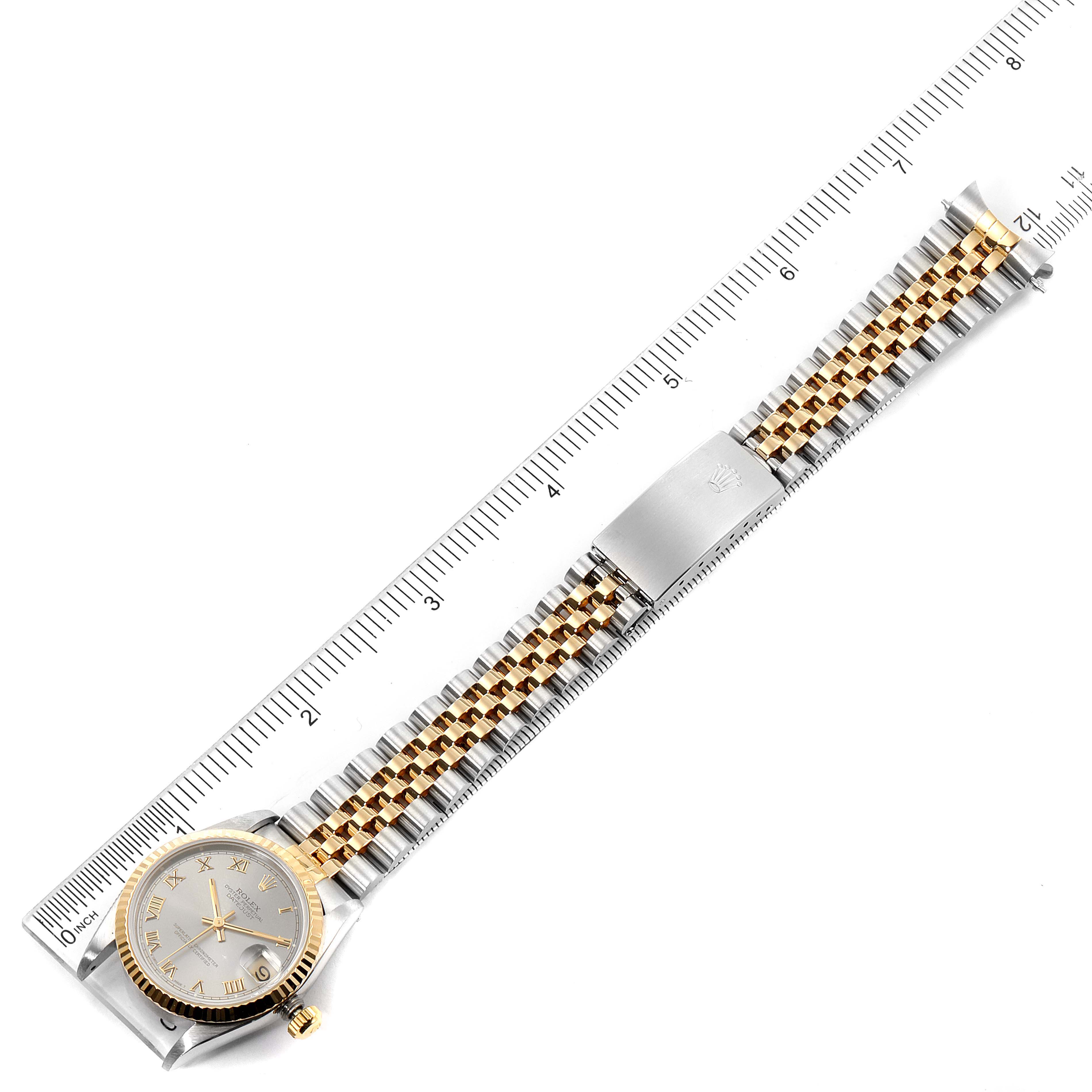 This image shows a top-down view of the entire Rolex Mid-Size 68273 Women's Steel and Gold (two tone) Grey Dial 68273 Women's Steel and Gold (two tone) Grey Dial watch, including the face, bezel, bracelet, and clasp.
