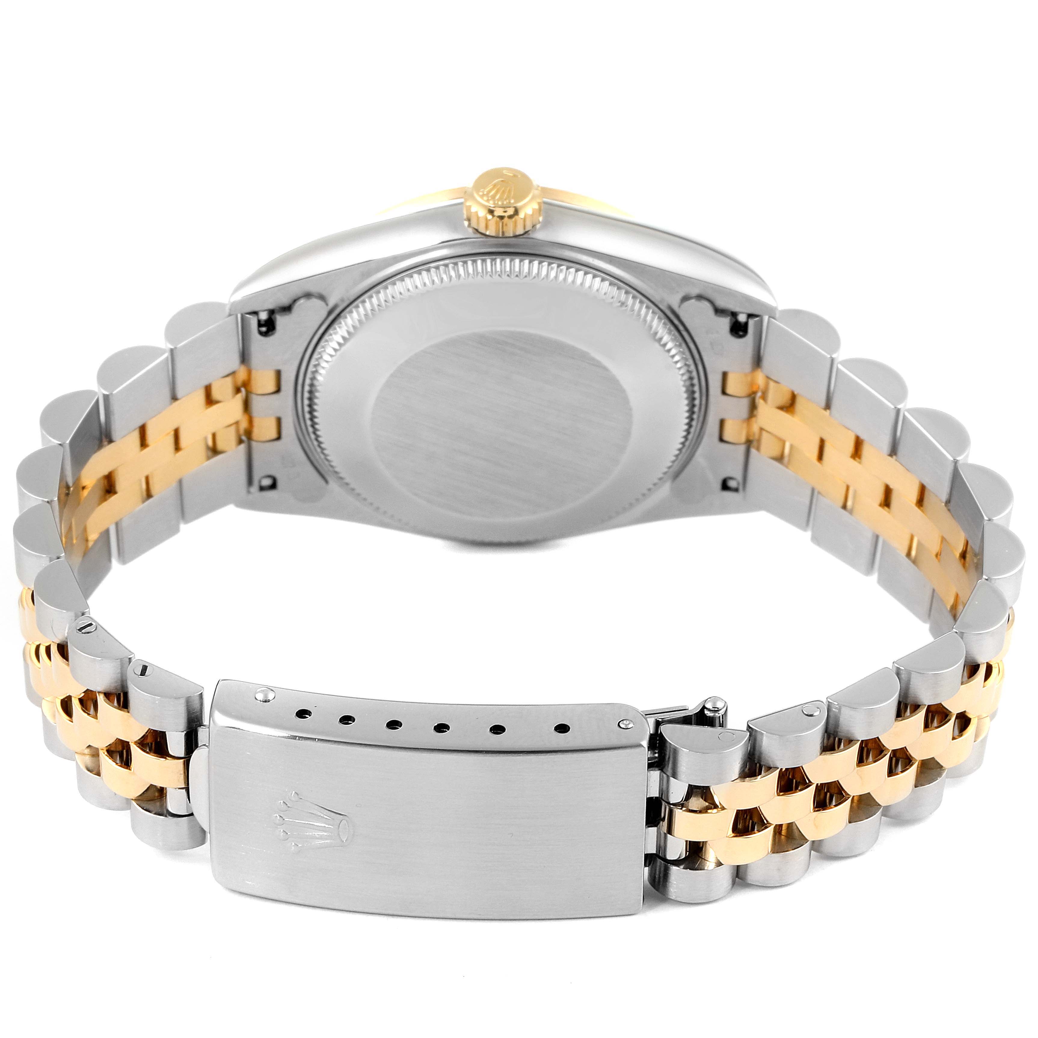 The image shows the back view of a Rolex Mid-Size 68273 Women's Steel and Gold (two tone) Grey Dial 68273 Women's Steel and Gold (two tone) Grey Dial watch, highlighting the case back, crown, and two-tone bracelet with the clasp.