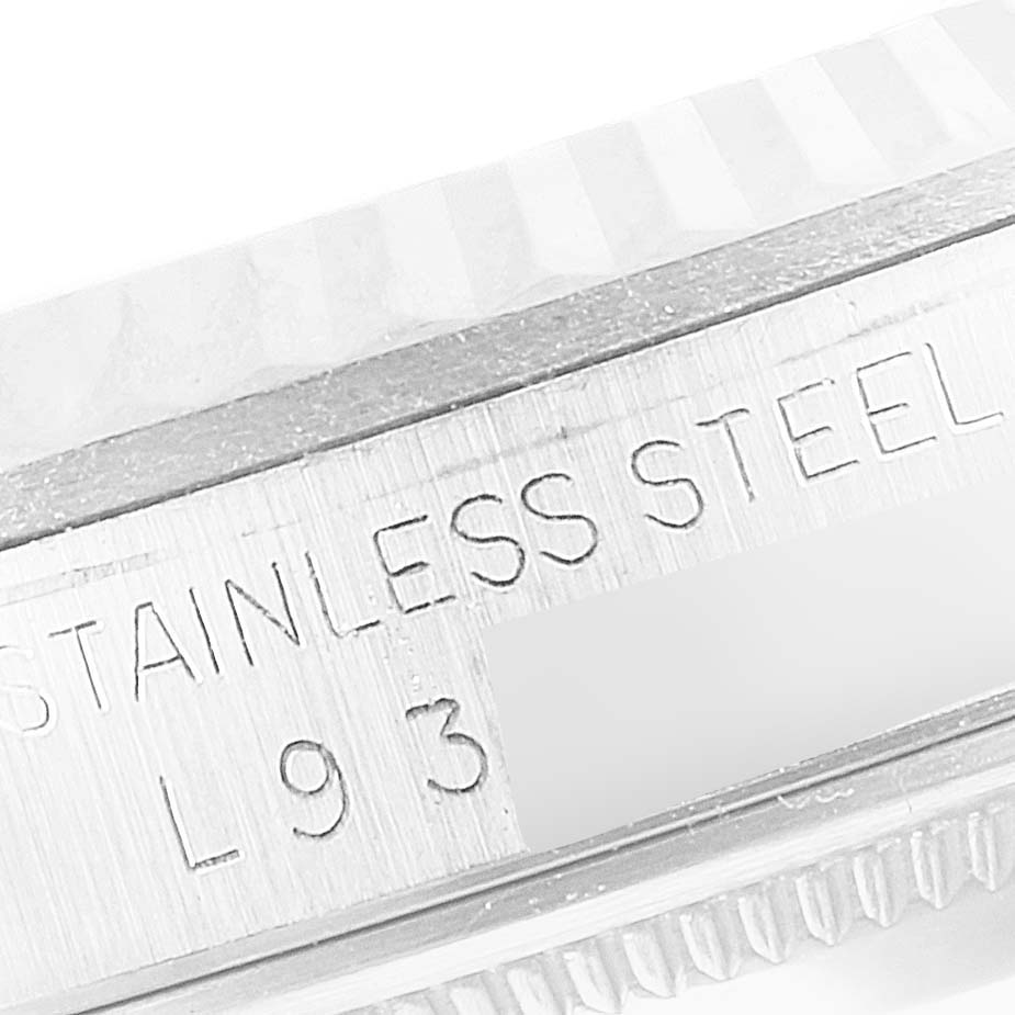 This close-up image shows the side engraving on a stainless steel Rolex Datejust 16234 Men's Stainless Steel Silver Dial 16234 Men's Stainless Steel Silver Dial watch.