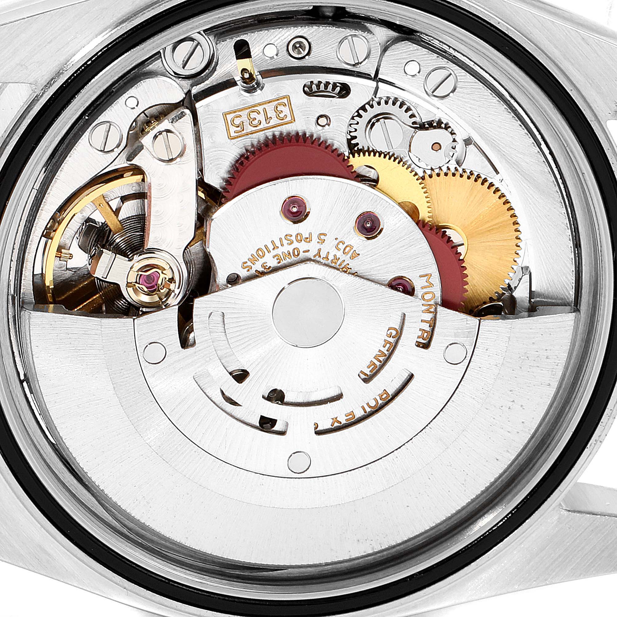 The image shows the internal movement and intricate gears of a Rolex Datejust 16234 Men's Stainless Steel Silver Dial 16234 Men's Stainless Steel Silver Dial watch from a close-up, top-down angle.