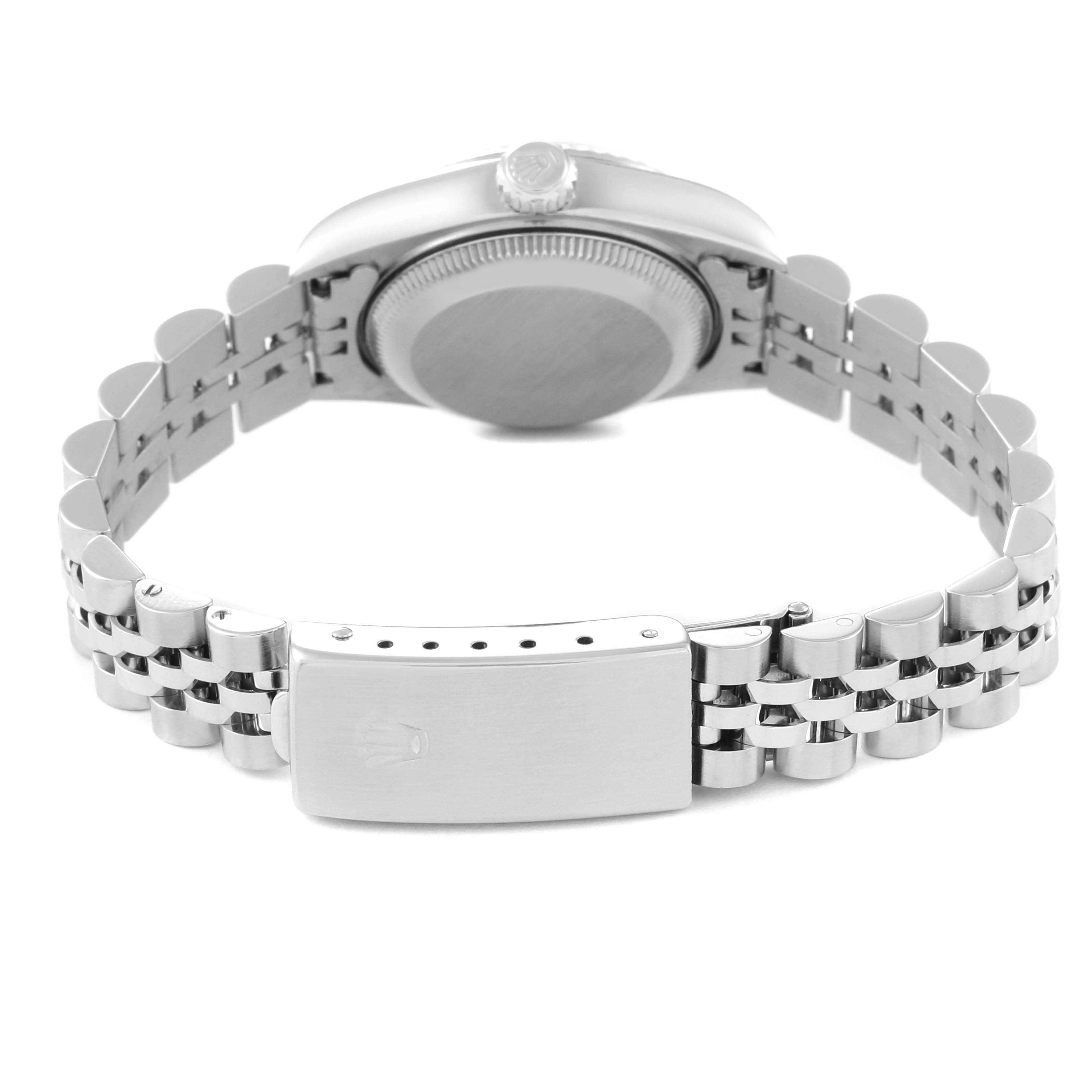 This Rolex Datejust 79174 Women's Stainless Steel Silver Dial 79174 Women's Stainless Steel Silver Dial watch is shown from the back, featuring its Jubilee bracelet and closed clasp.