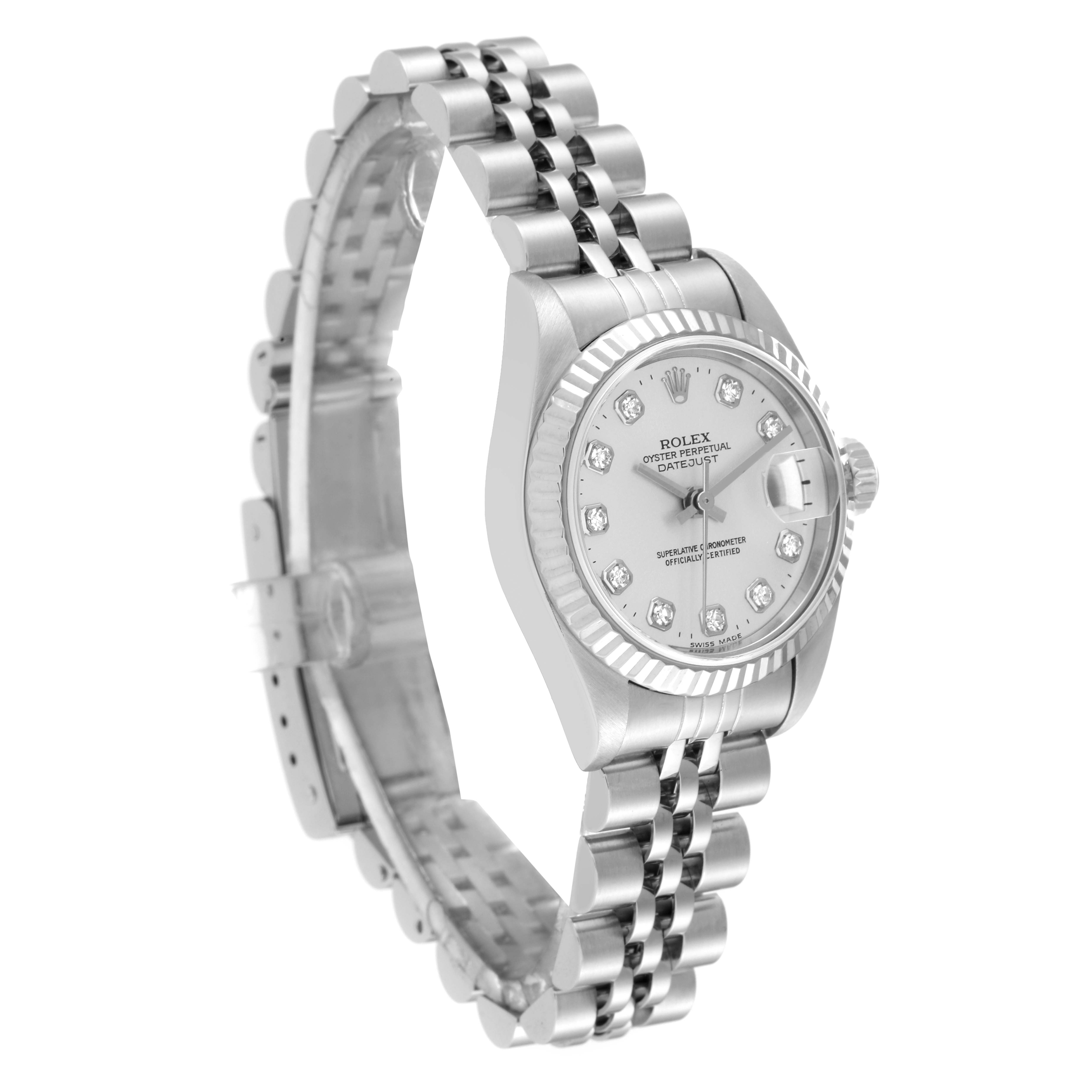 The image shows a side angle of a Rolex Datejust 79174 Women's Stainless Steel Silver Dial 79174 Women's Stainless Steel Silver Dial watch featuring its bracelet, case, dial, and a partially open clasp.
