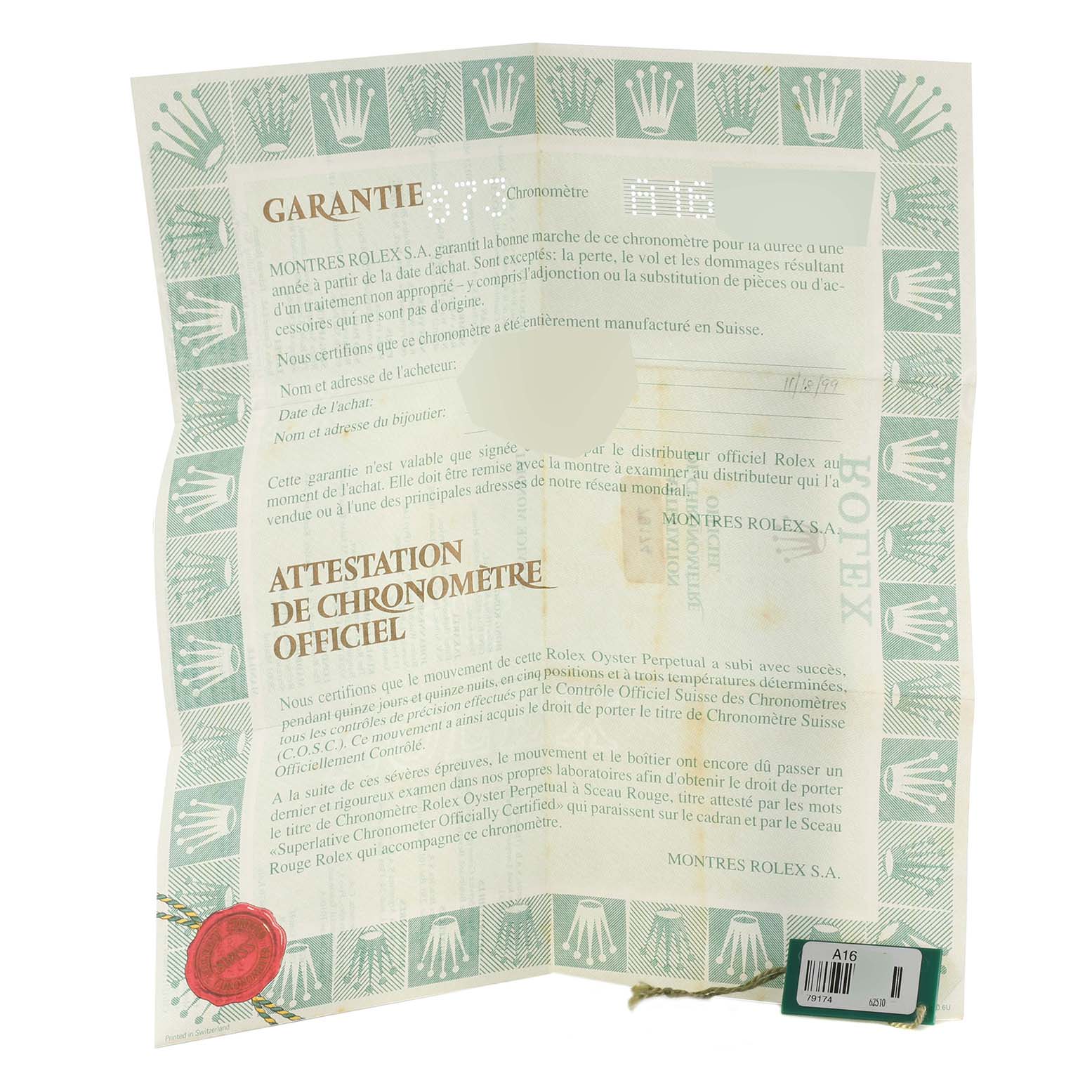 The image shows a warranty and chronometer certificate for a Rolex Datejust 79174 Women's Stainless Steel Silver Dial 79174 Women's Stainless Steel Silver Dial watch, taken from a top view.