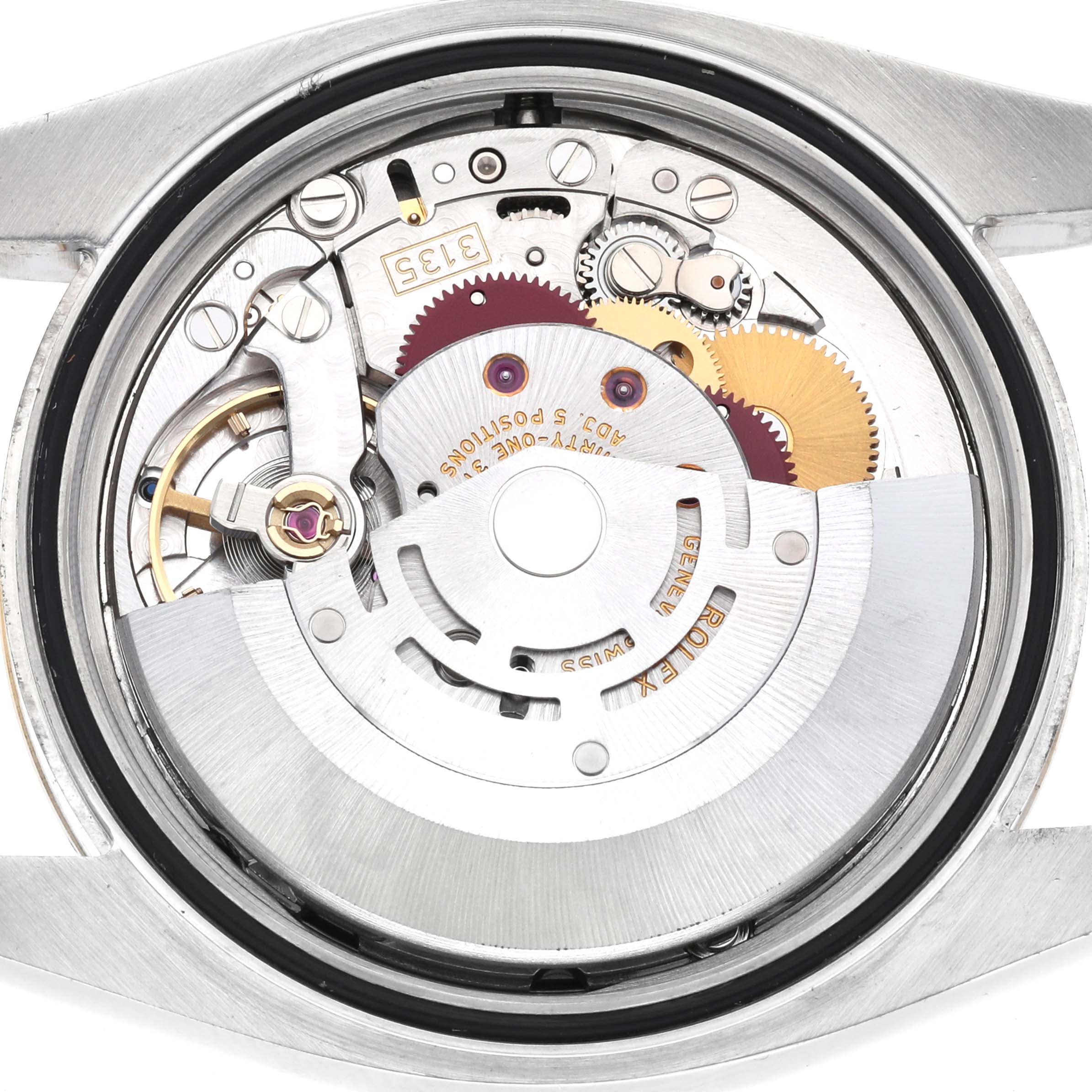 The image shows the internal mechanism of a Rolex Datejust 116233 Men's Steel and Gold (two tone) Black Dial watch, focusing on the movement parts from a rear angle.