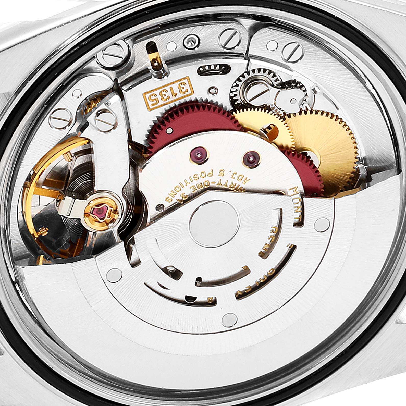 This image shows a close-up view of the inner mechanical movement of a Rolex Datejust 16233 Men's Steel and Gold (two tone) Black Dial 16233 Men's Steel and Gold (two tone) Black Dial watch.