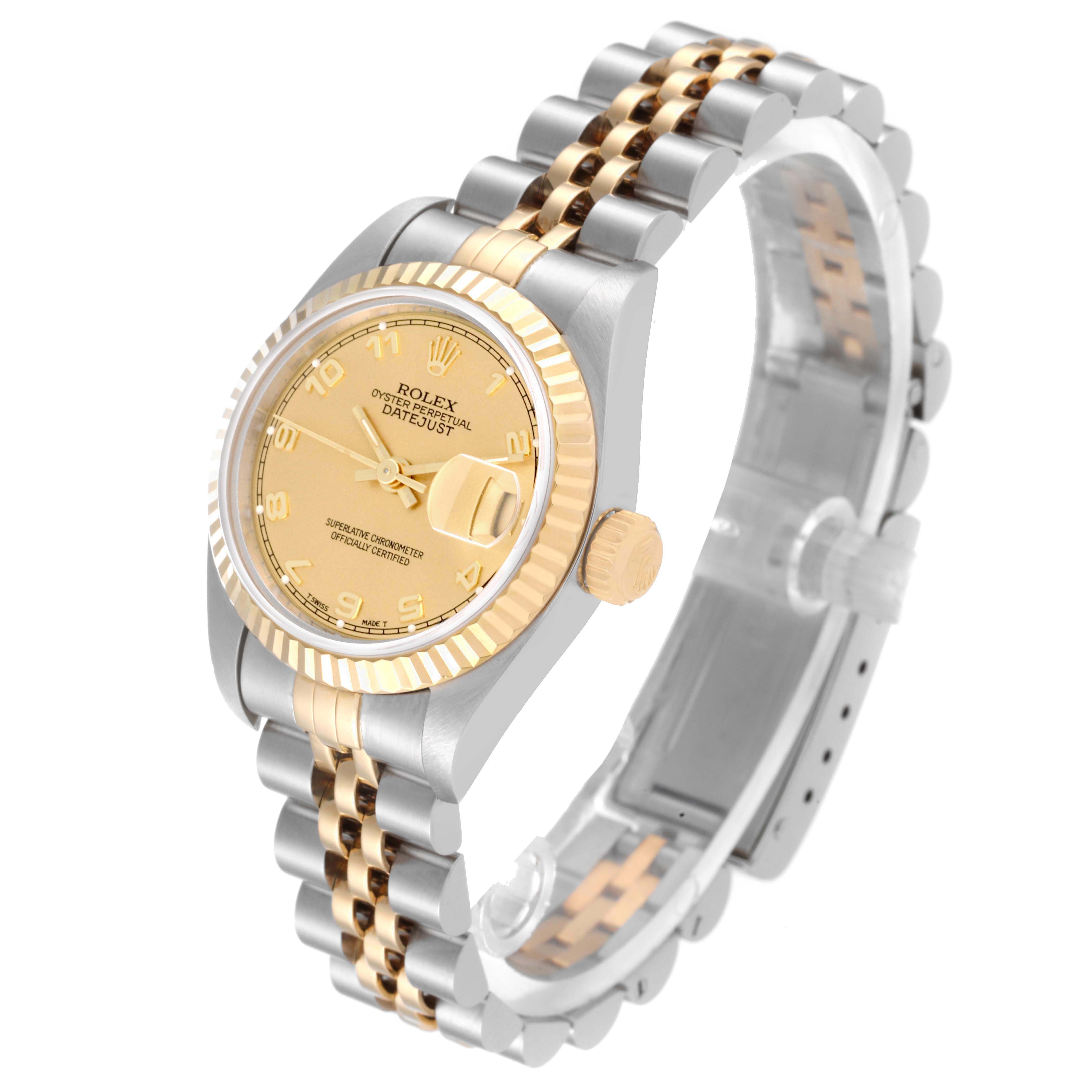 This image shows a Rolex Datejust 69173 Women's Steel and Gold (two tone) Champagne Dial 69173 Women's Steel and Gold (two tone) Champagne Dial watch from an angled side view, highlighting the face, bezel, crown, and two-tone bracelet.