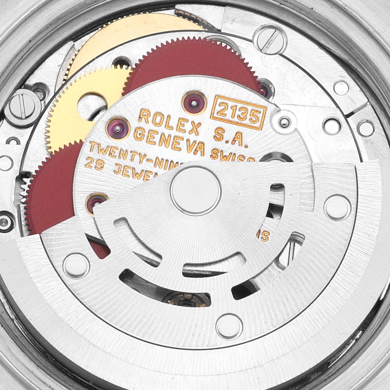 The image shows the internal mechanical movement of a Rolex Datejust 69173 Women's Steel and Gold (two tone) Champagne Dial 69173 Women's Steel and Gold (two tone) Champagne Dial watch, including gears and the rotor.