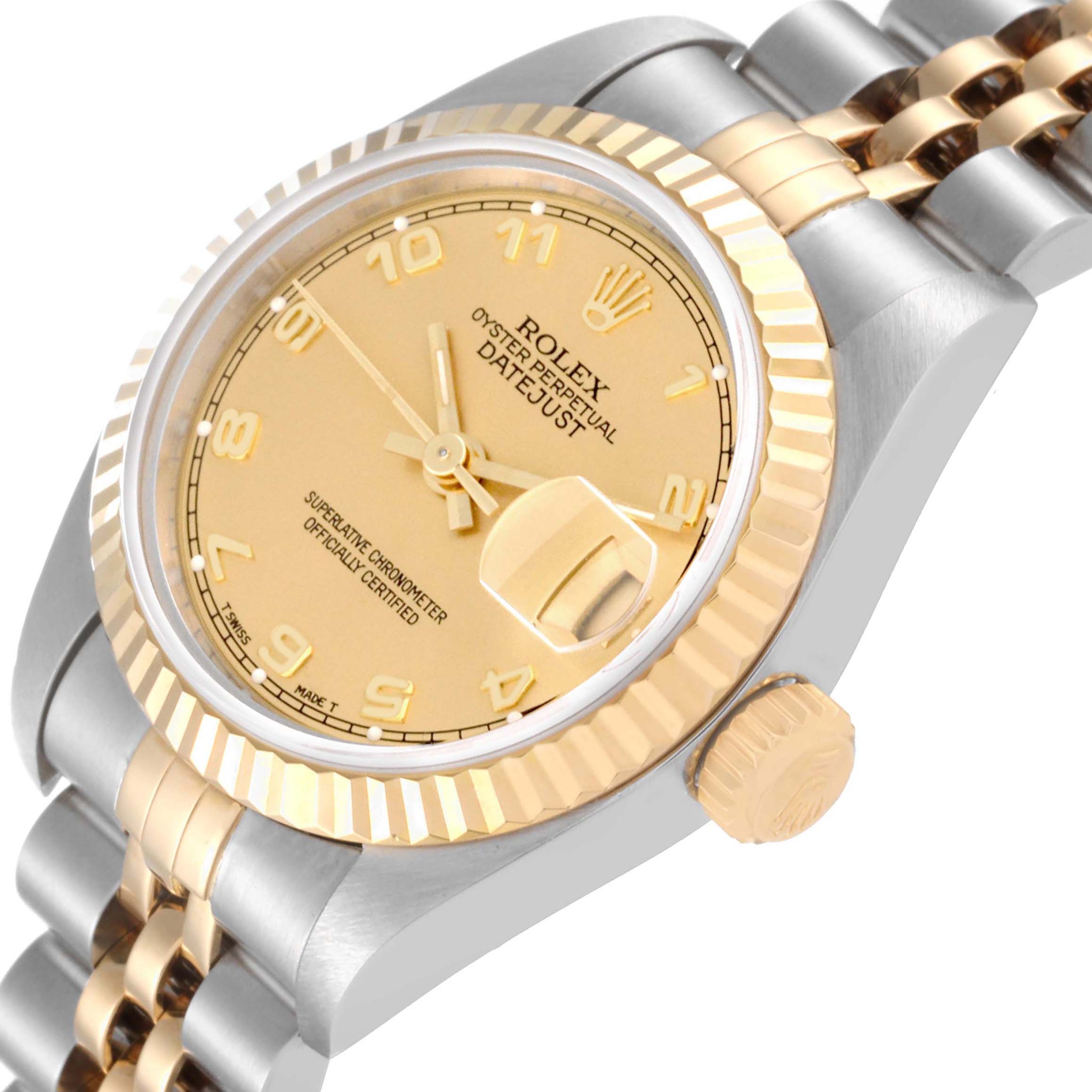 The image shows a close-up, slightly angled view of a Rolex Datejust 69173 Women's Steel and Gold (two tone) Champagne Dial 69173 Women's Steel and Gold (two tone) Champagne Dial watch, highlighting the dial, bezel, crown, and part of the bracelet.