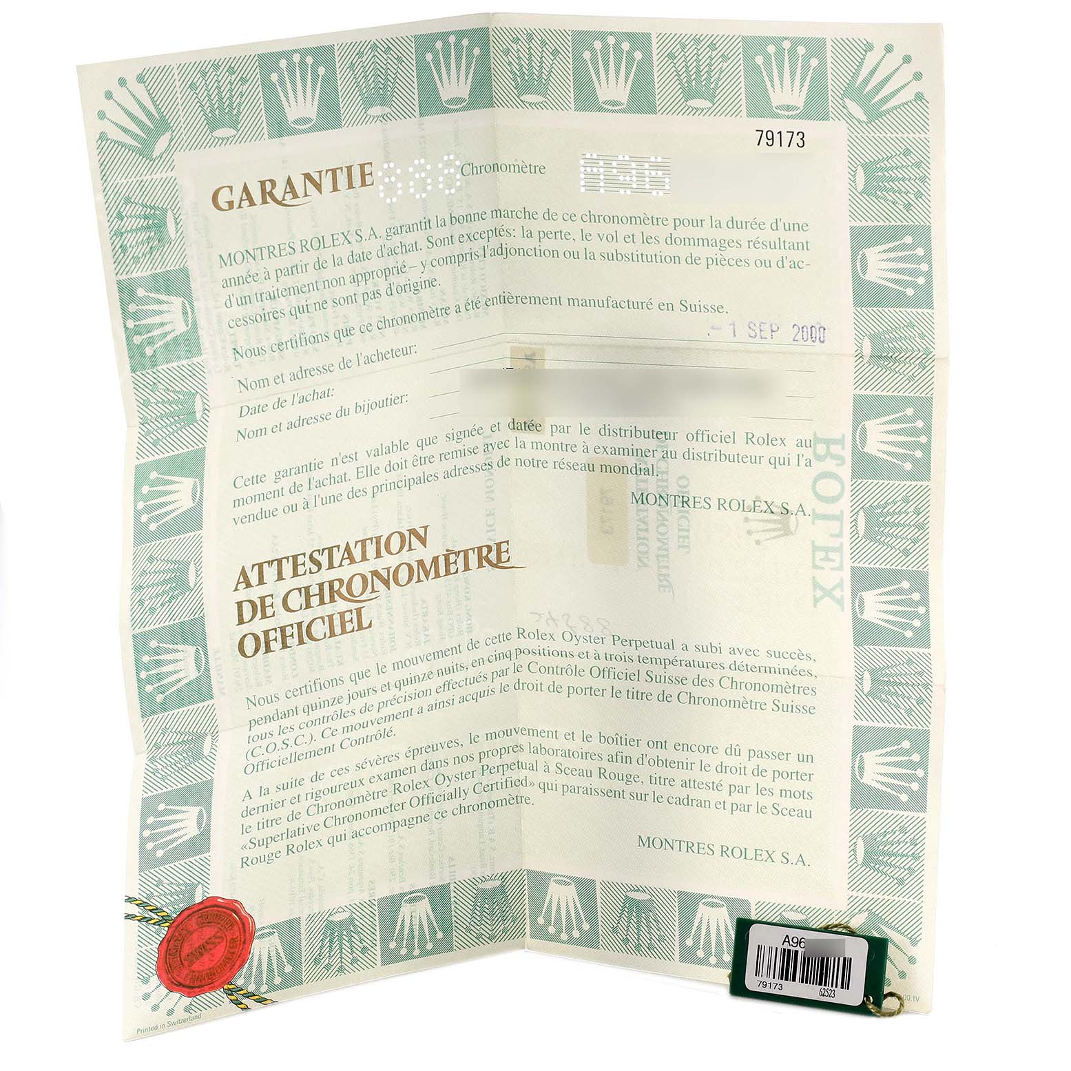 The image shows the warranty certificate and chronometer certification for a Rolex Datejust 79173 Women's Steel and Gold (two tone) Red Dial 79173 Women's Steel and Gold (two tone) Red Dial watch.