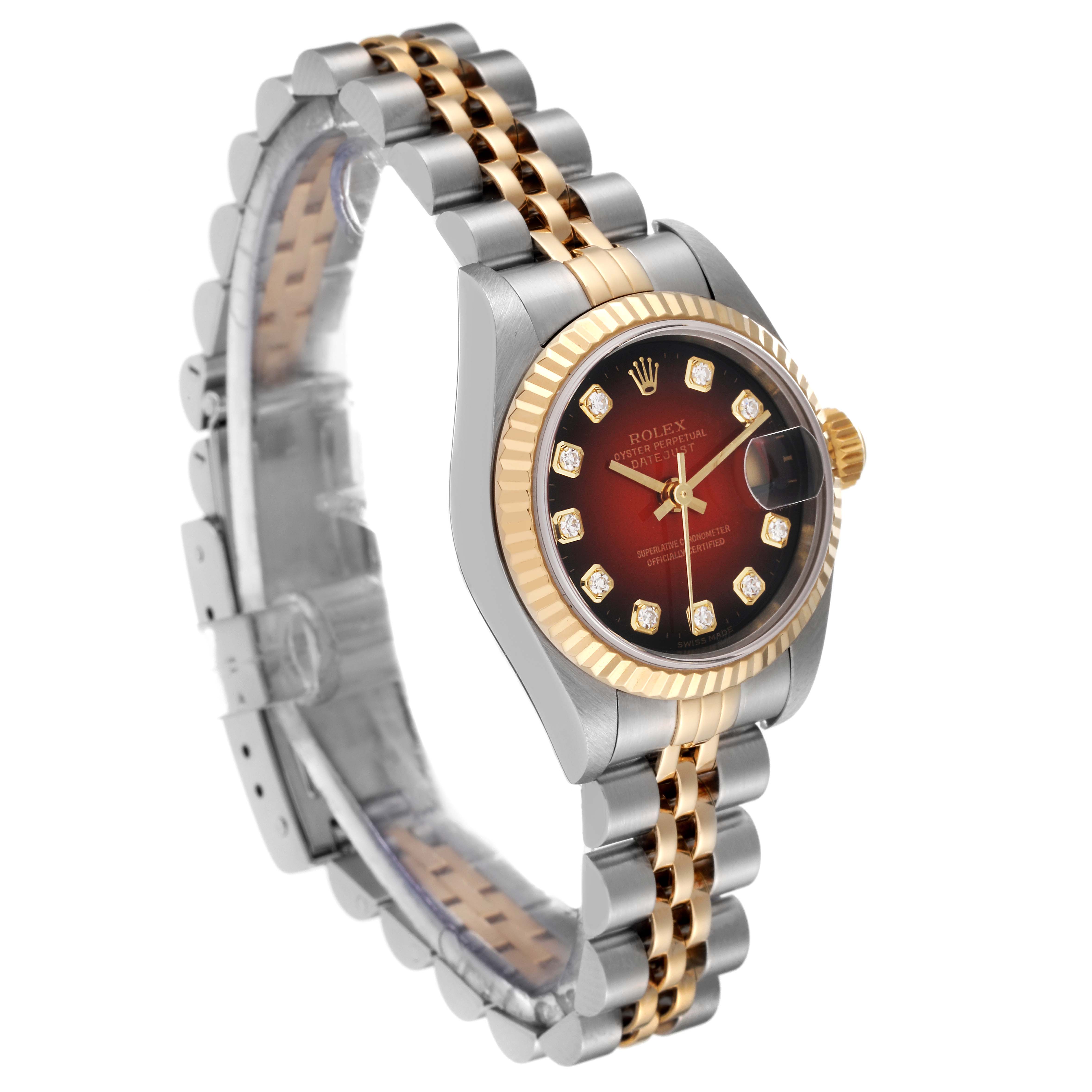 The Rolex Datejust 79173 Women's Steel and Gold (two tone) Red Dial 79173 Women's Steel and Gold (two tone) Red Dial watch is shown at a three-quarter angle, highlighting its dial, bezel, and two-tone metal bracelet.
